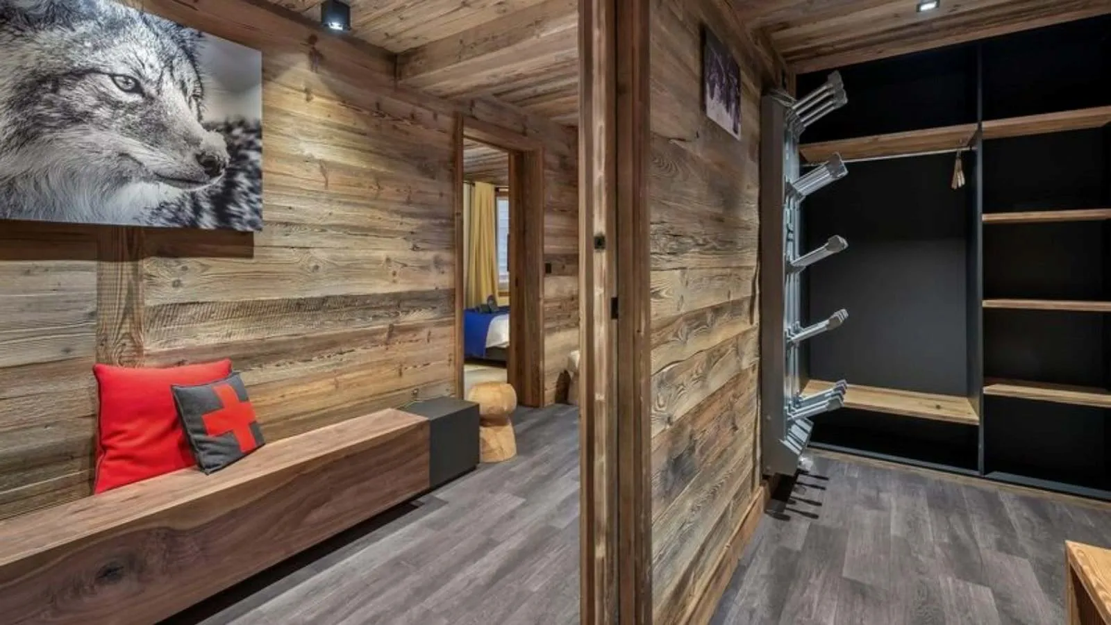 Ski room with built-in storage and heated boot racks