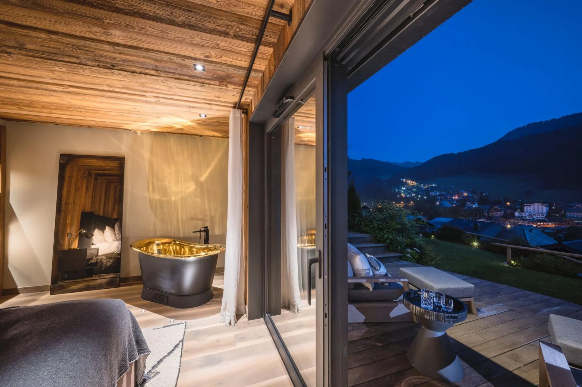 Queen bedroom with a freestanding copper bathtub and sun terrace