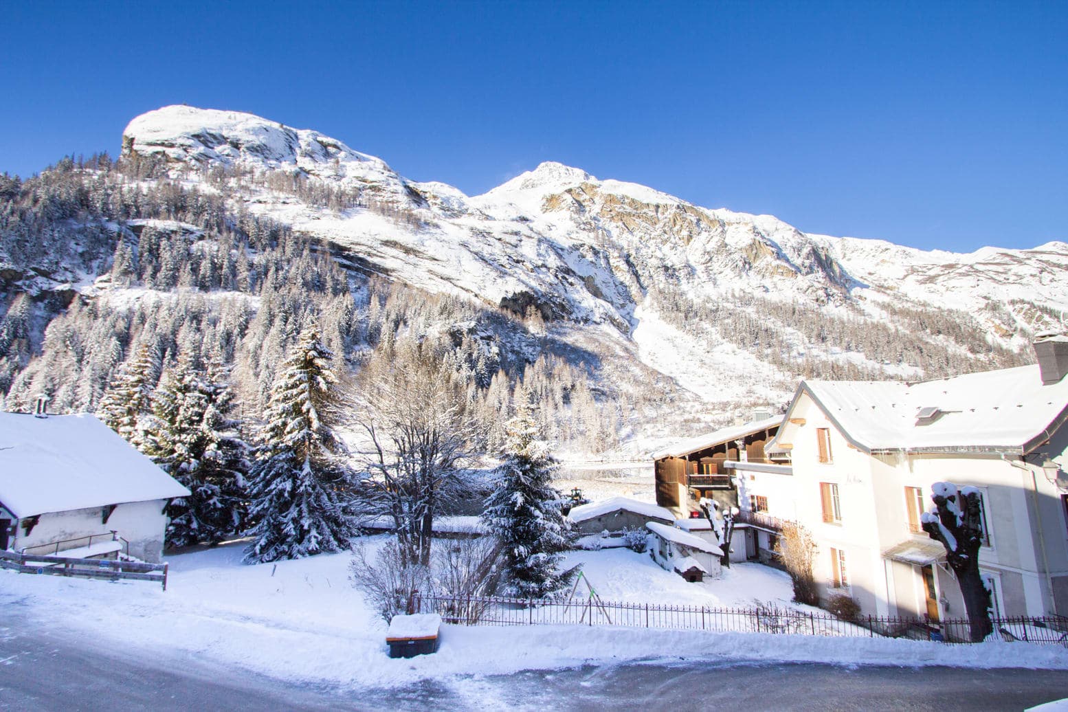 Property exterior with direct views of the surrounding snow-capped peaks