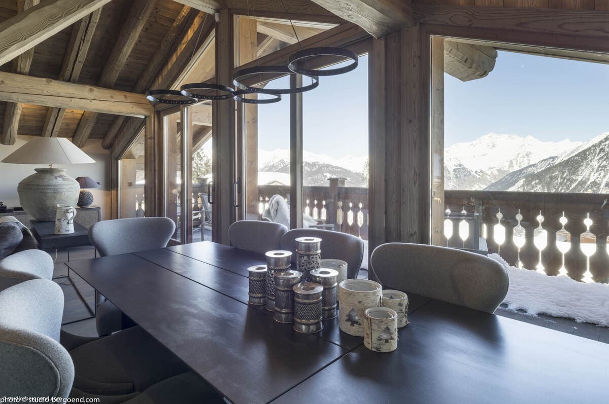 Dining area with seating for 8 and alpine mountain views