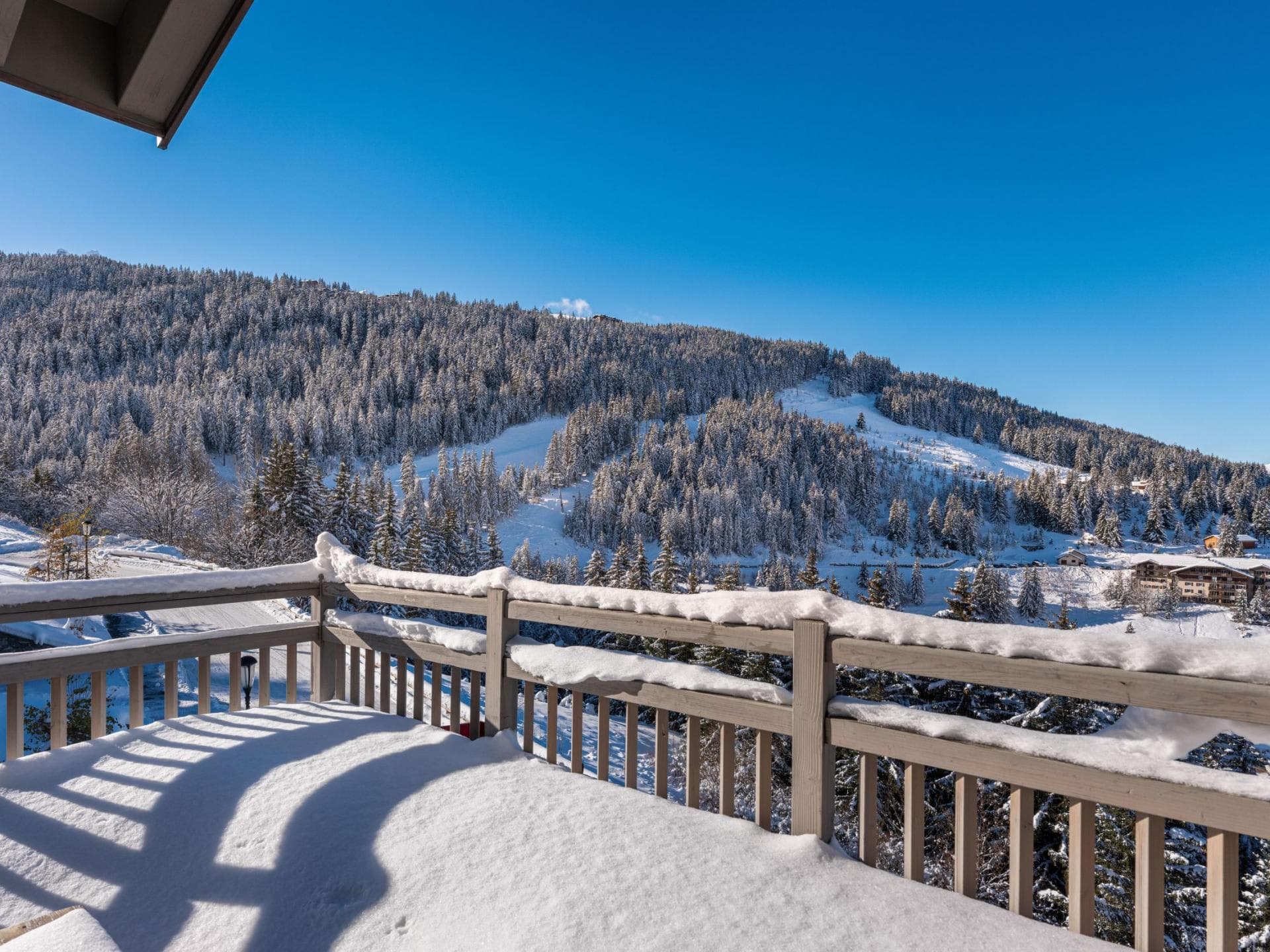 Private balcony with direct views of snow-covered ski runs