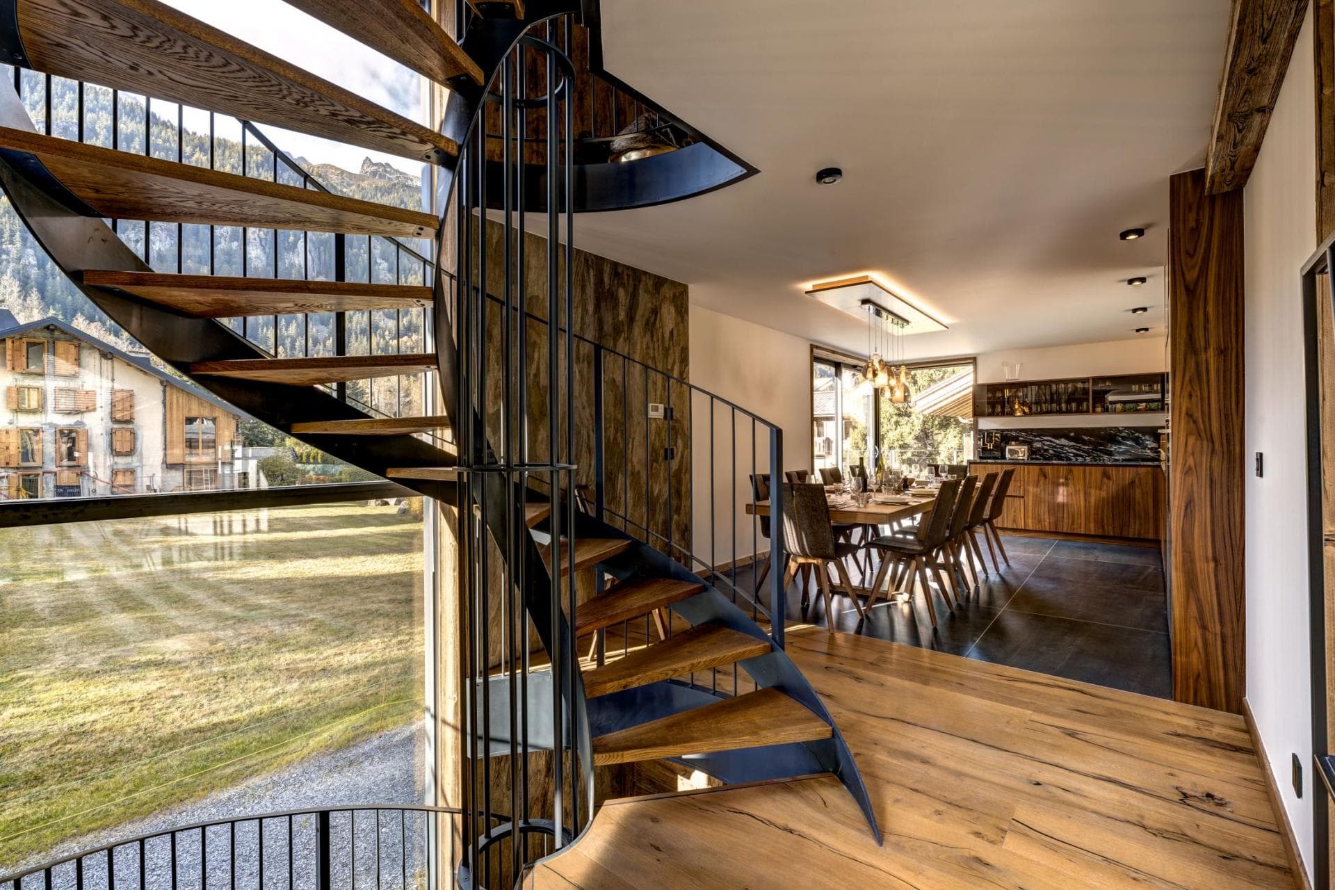 Spiral staircase; dining area seats 10 with mountain views