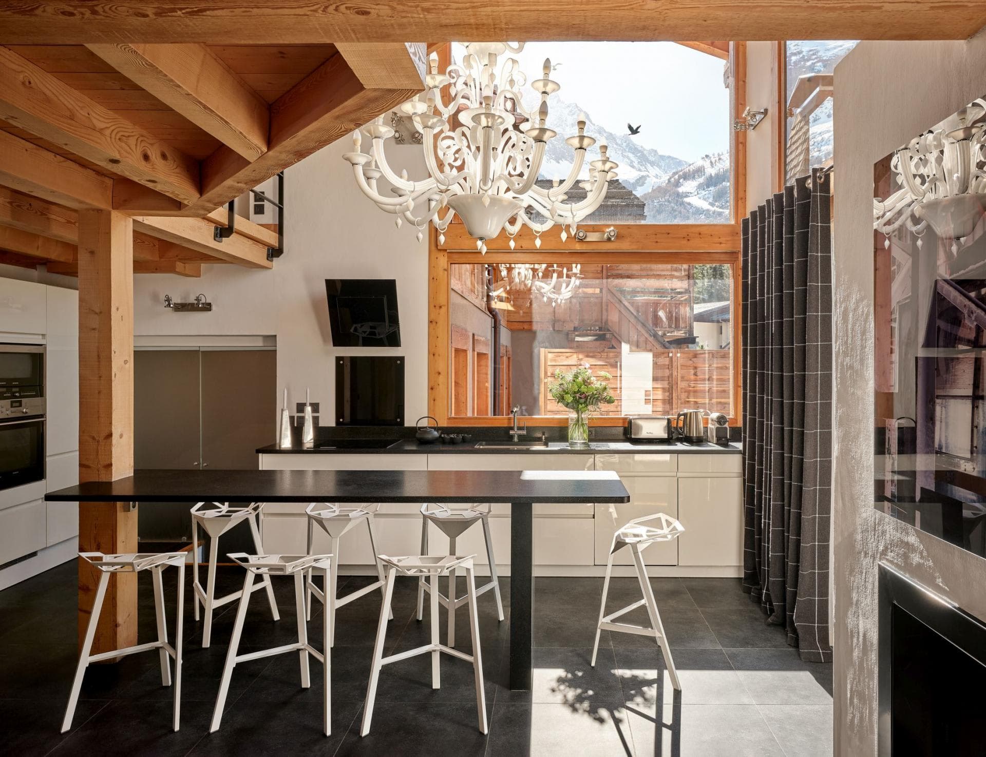 Kitchen with breakfast bar seating for 6 and mountain views