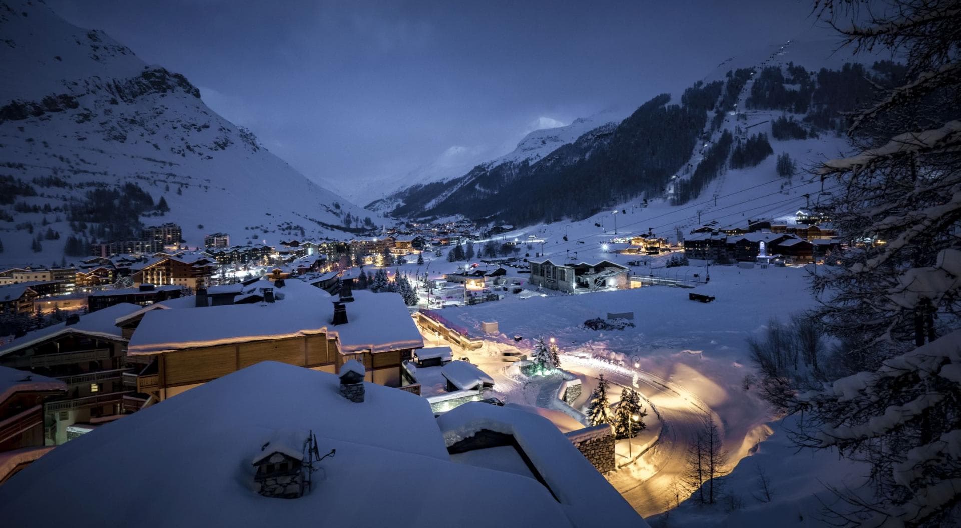 Ski-in view of Val d'Isère village and surrounding mountain peaks