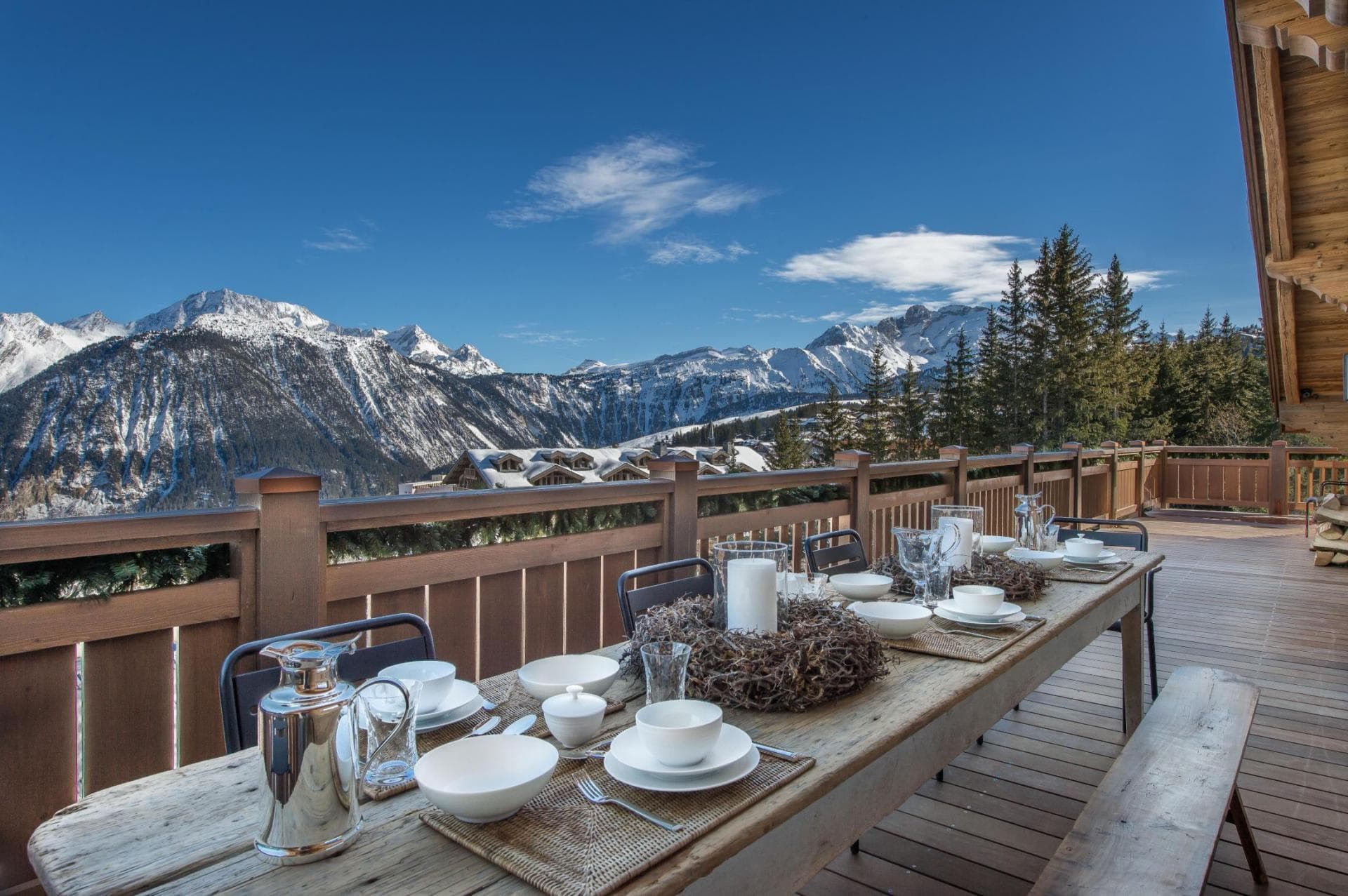 Deck dining for 8+ overlooks snow-capped peaks and valley; winter-ready setting