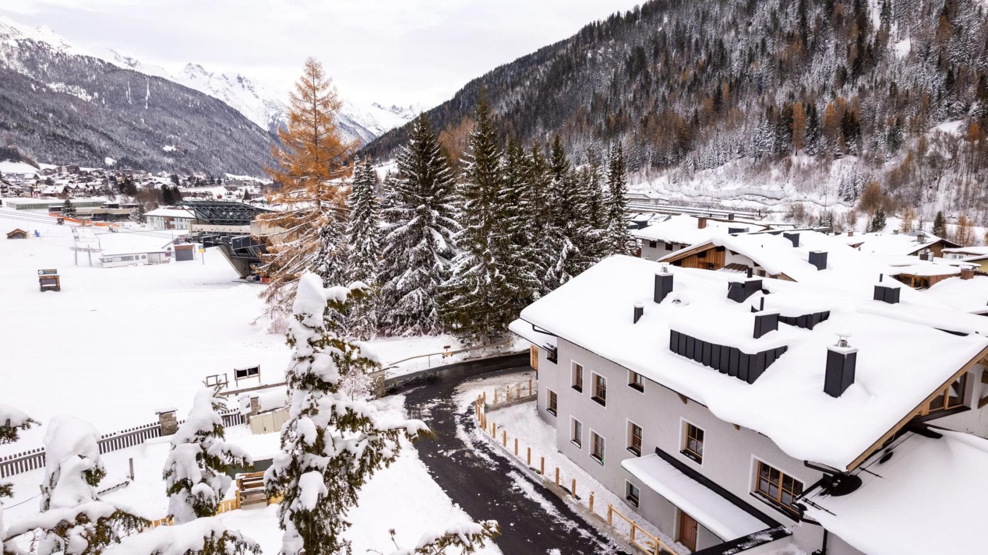 Chalet exterior with mountain views and direct ski lift access nearby