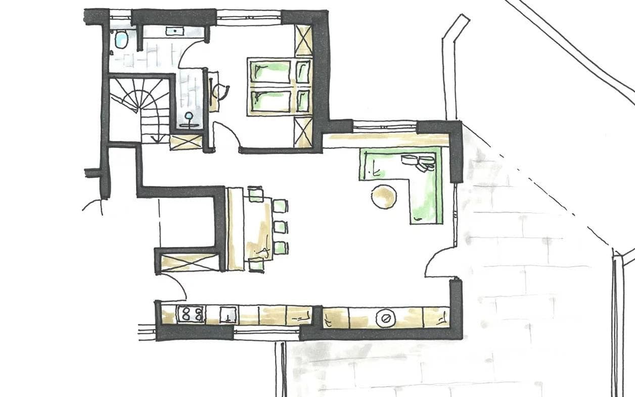 Floor plan: open-plan living and kitchen area with outdoor terrace and spiral staircase