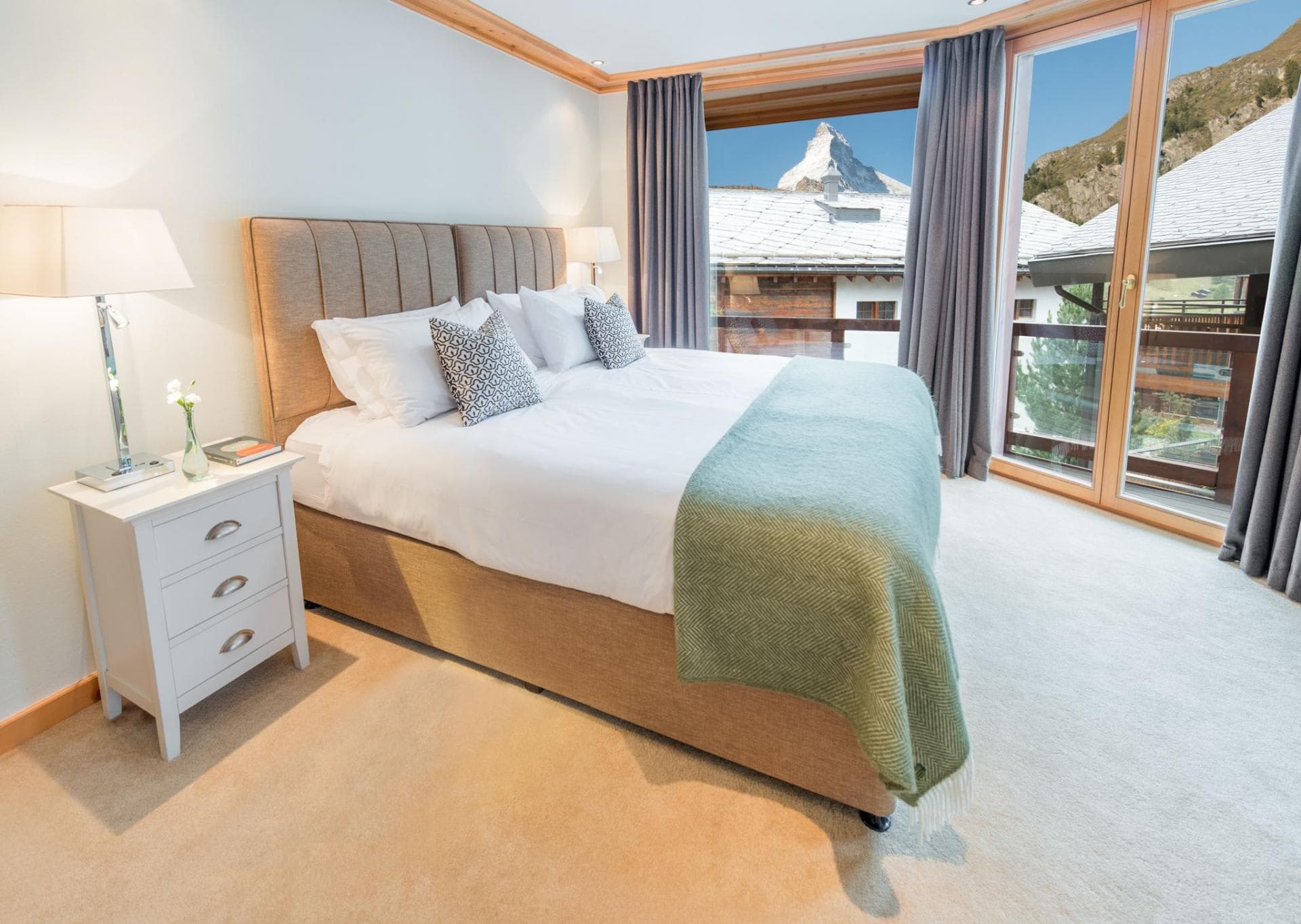 Primary bedroom with king bed and Matterhorn views