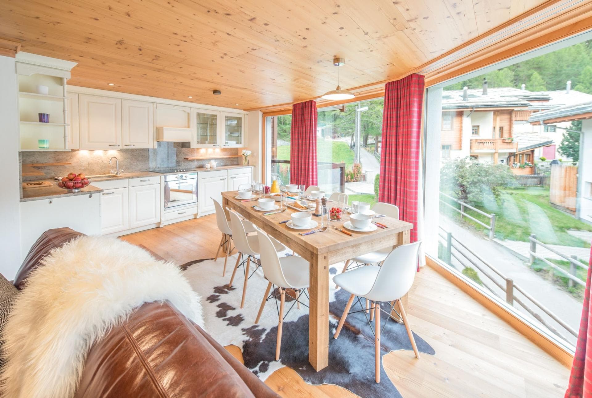Open kitchen and dining area with seating for 6 and garden views