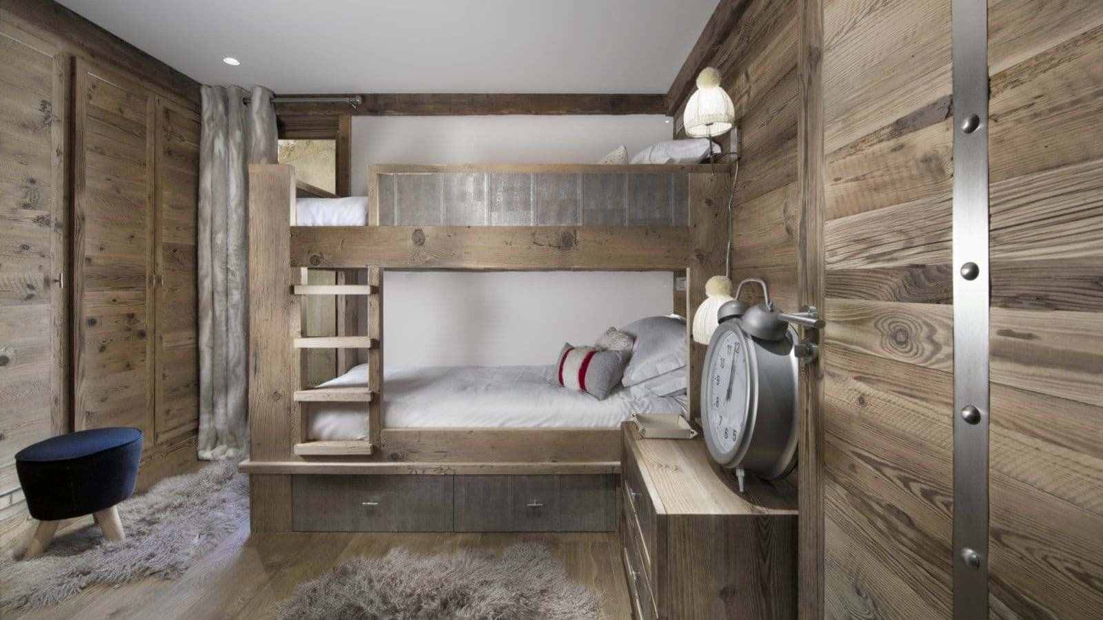 Bunk room with built-in twin beds and under-bed storage drawers