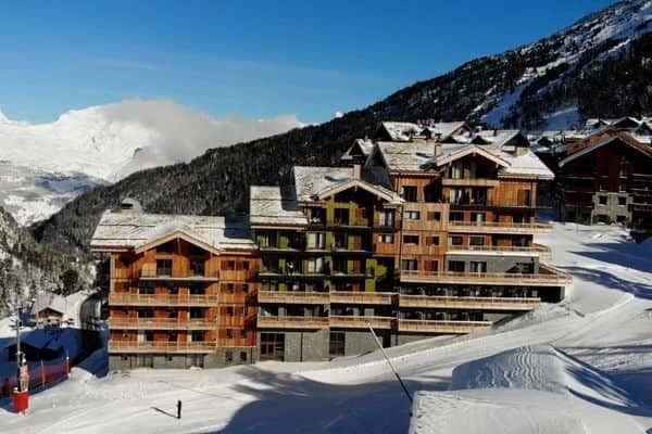 Ski-in/ski-out chalet with private balconies and direct mountain access