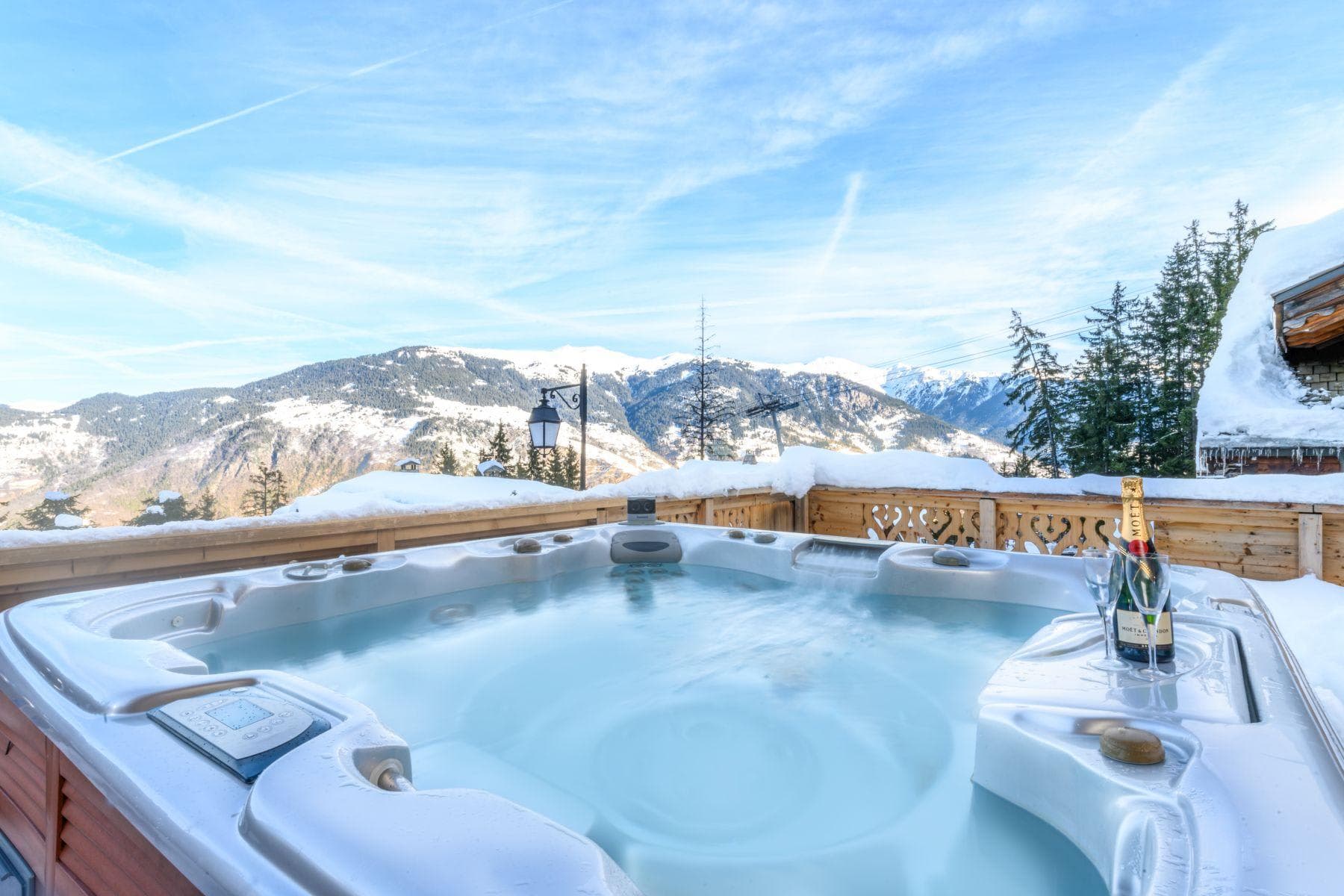 Outdoor hot tub seats 6; mountain and valley views