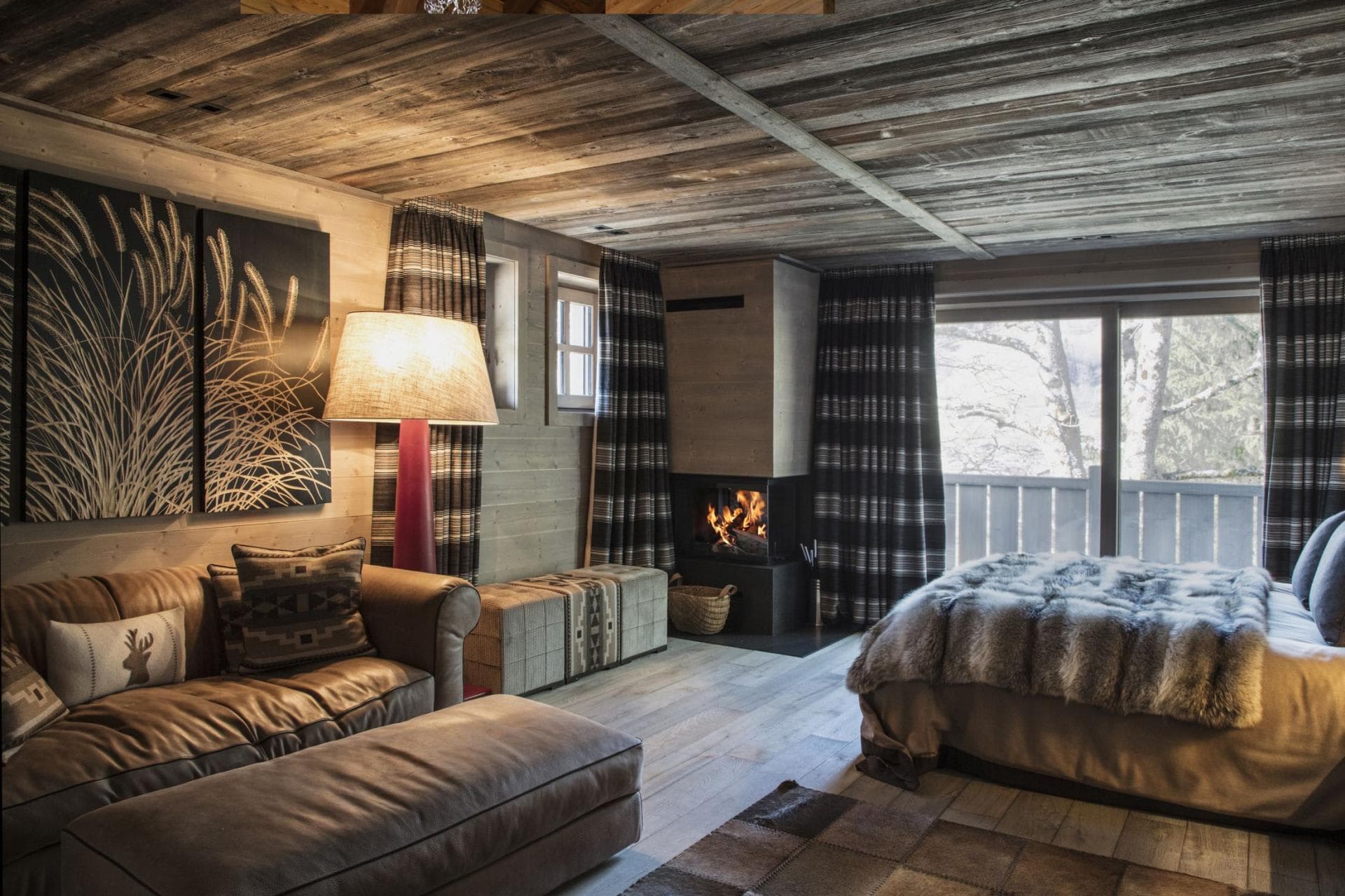 Primary suite with wood-burning fireplace and private balcony access