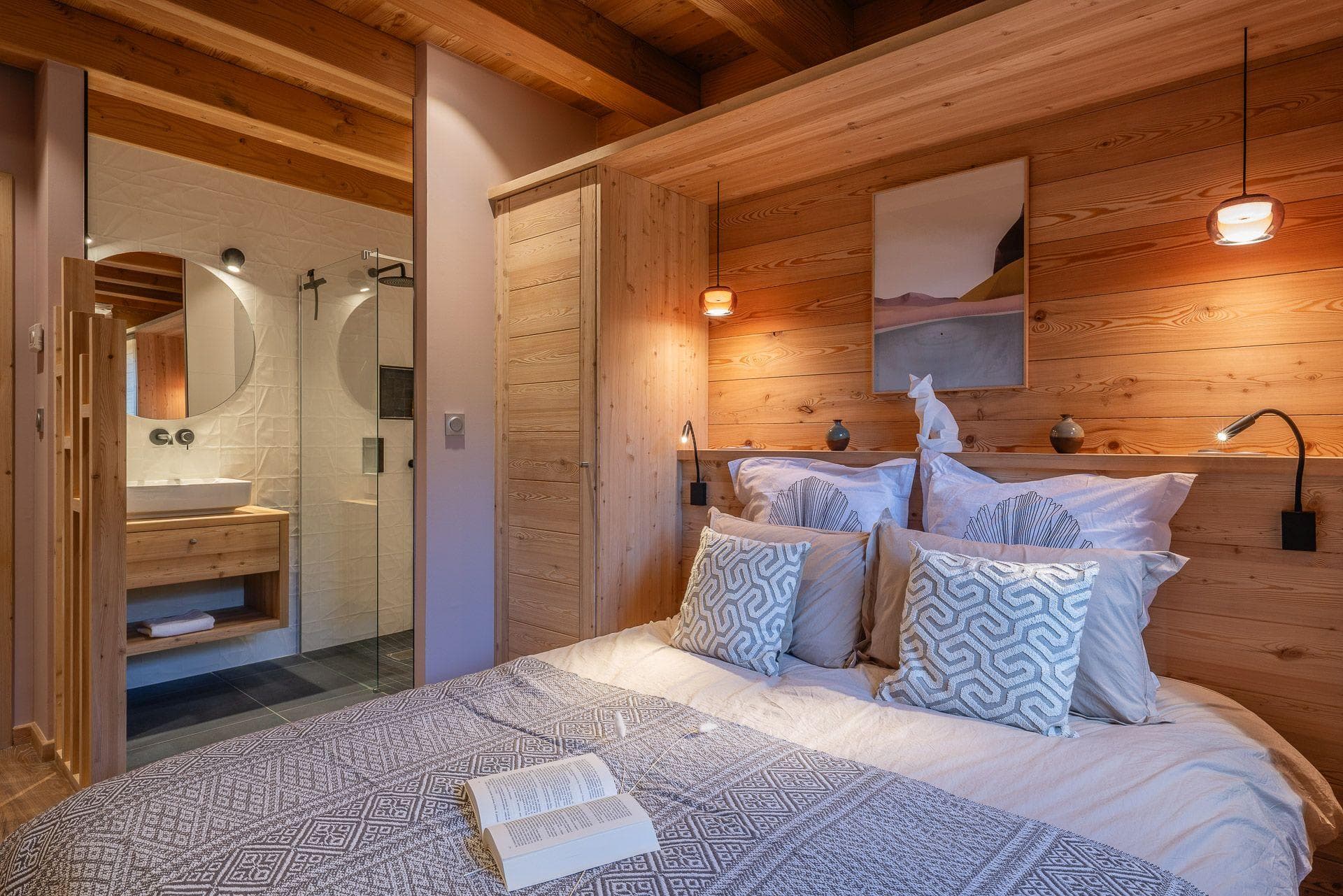 Queen bedroom with ensuite bathroom featuring a walk-in rainfall shower