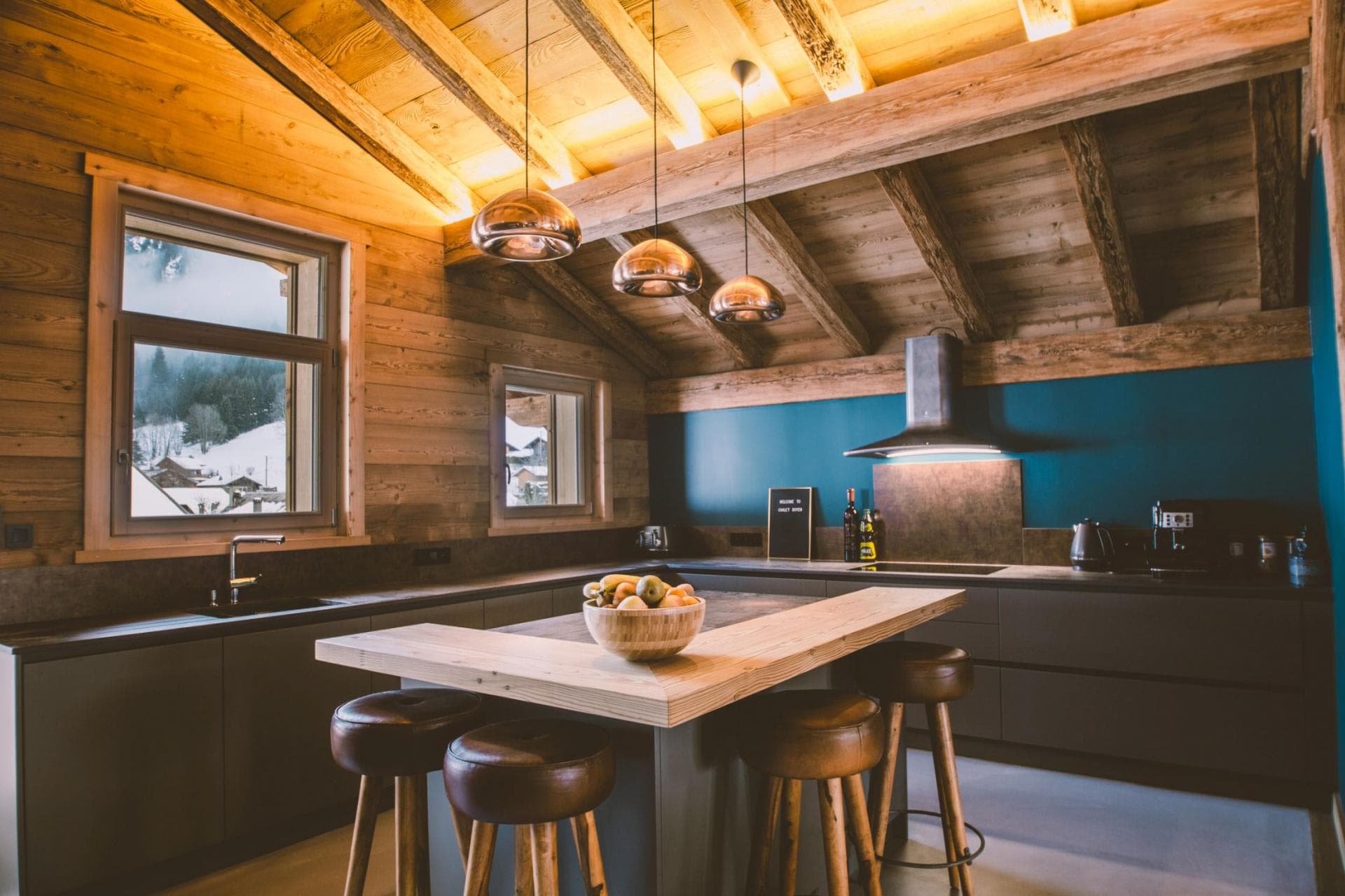 Kitchen island with seating for 4 and snowy mountain views