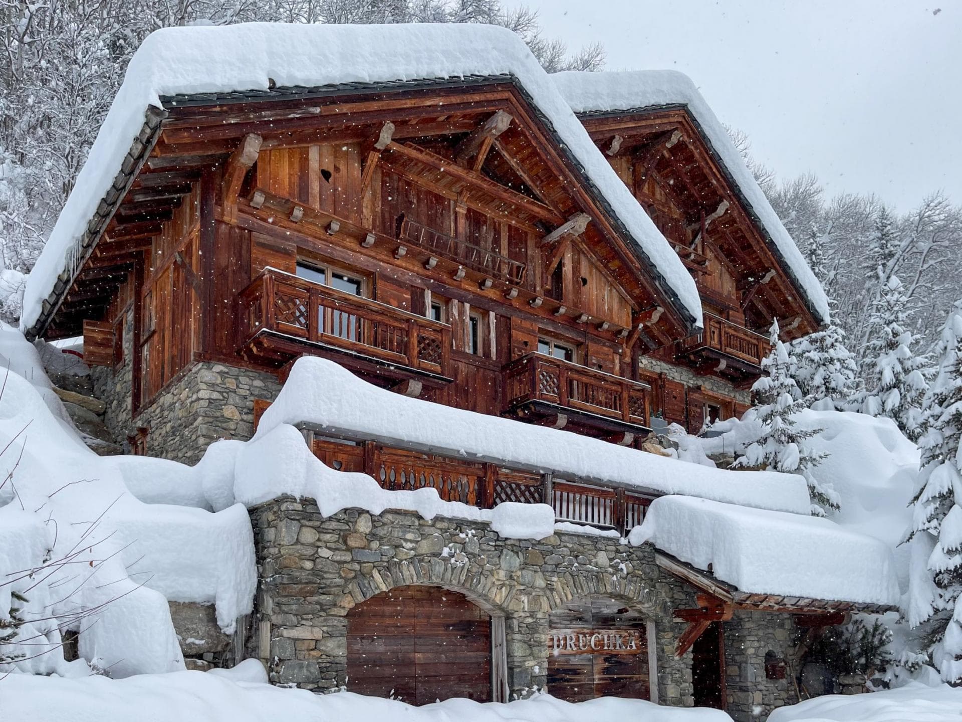 Ski-in chalet with stone foundation and heated two-car garage