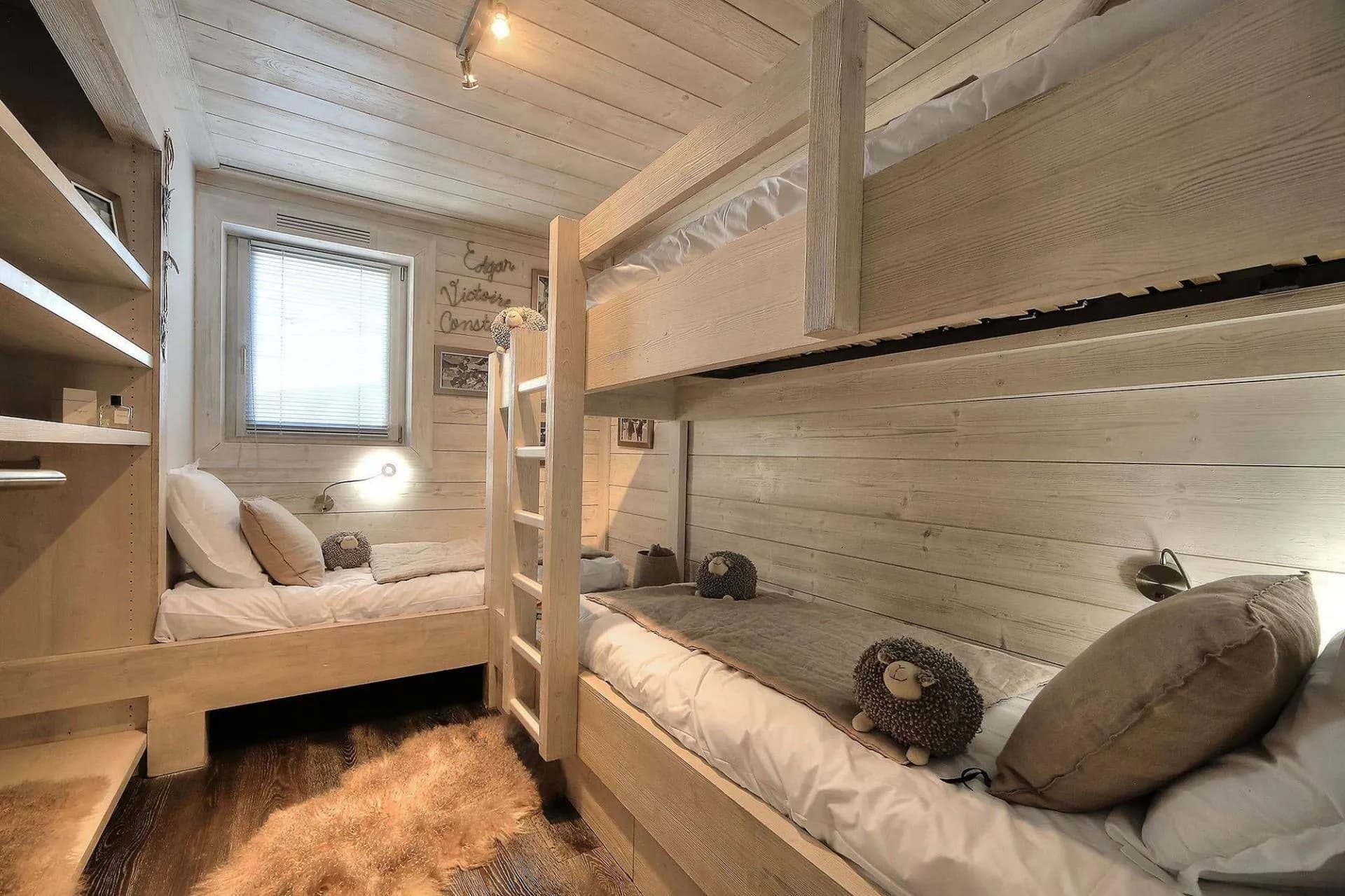 Children’s bedroom with bunk bed and separate single bed
