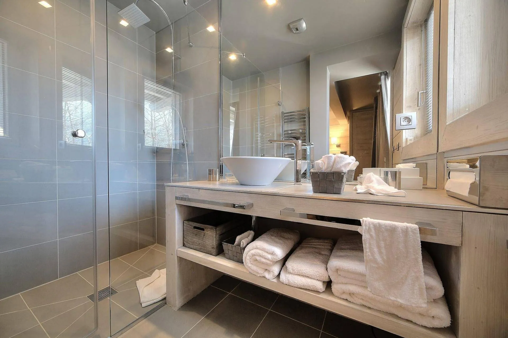 Shower room with basin and heated towel rail