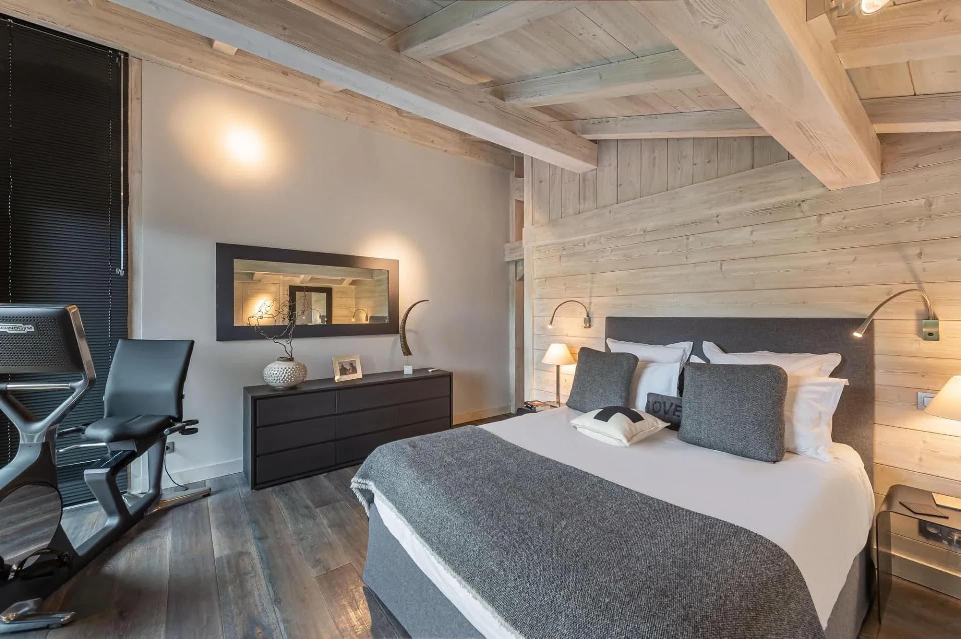 Double bedroom with television and dressing area
