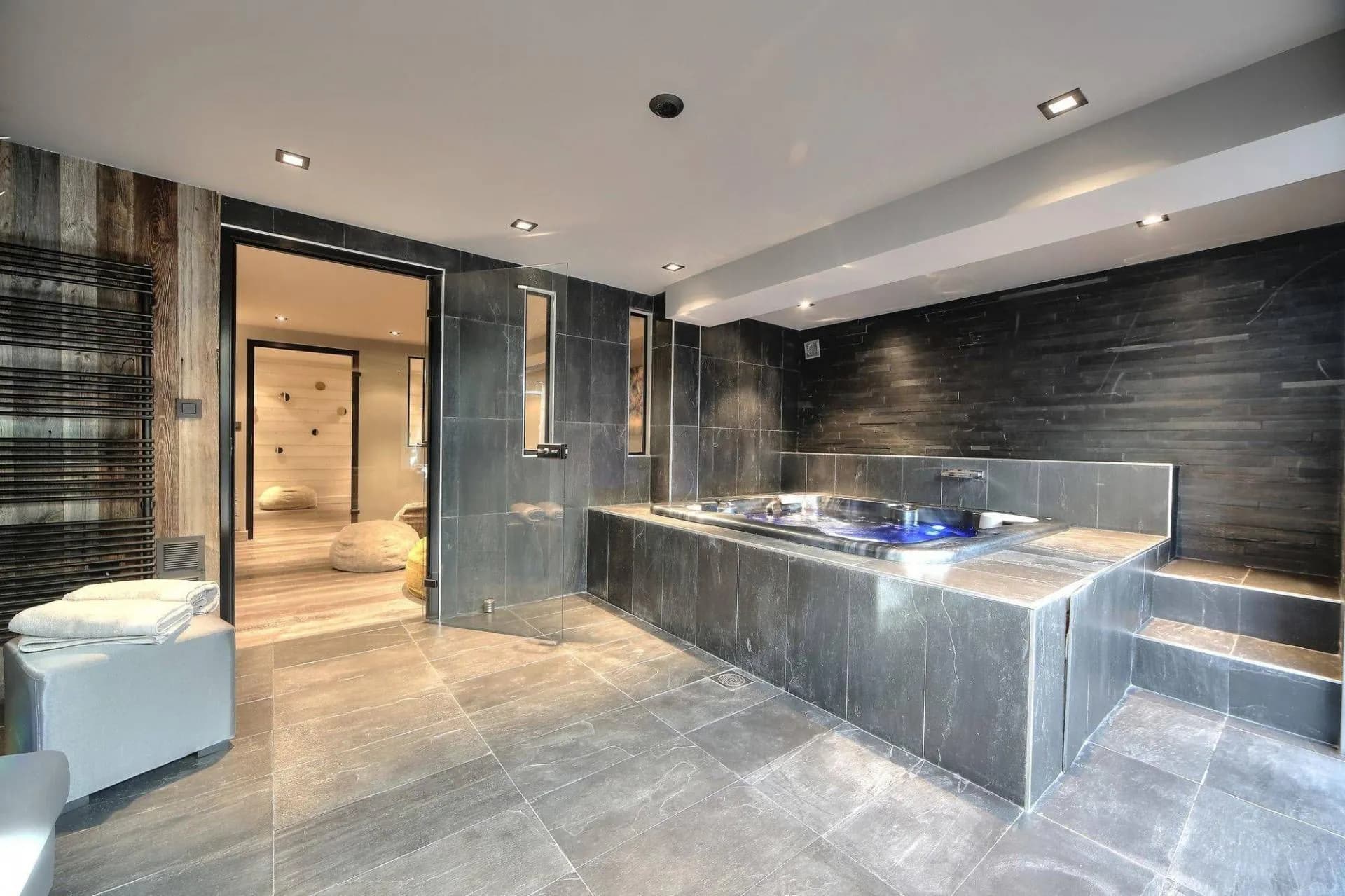 Indoor hot tub in the lower-level wellness room