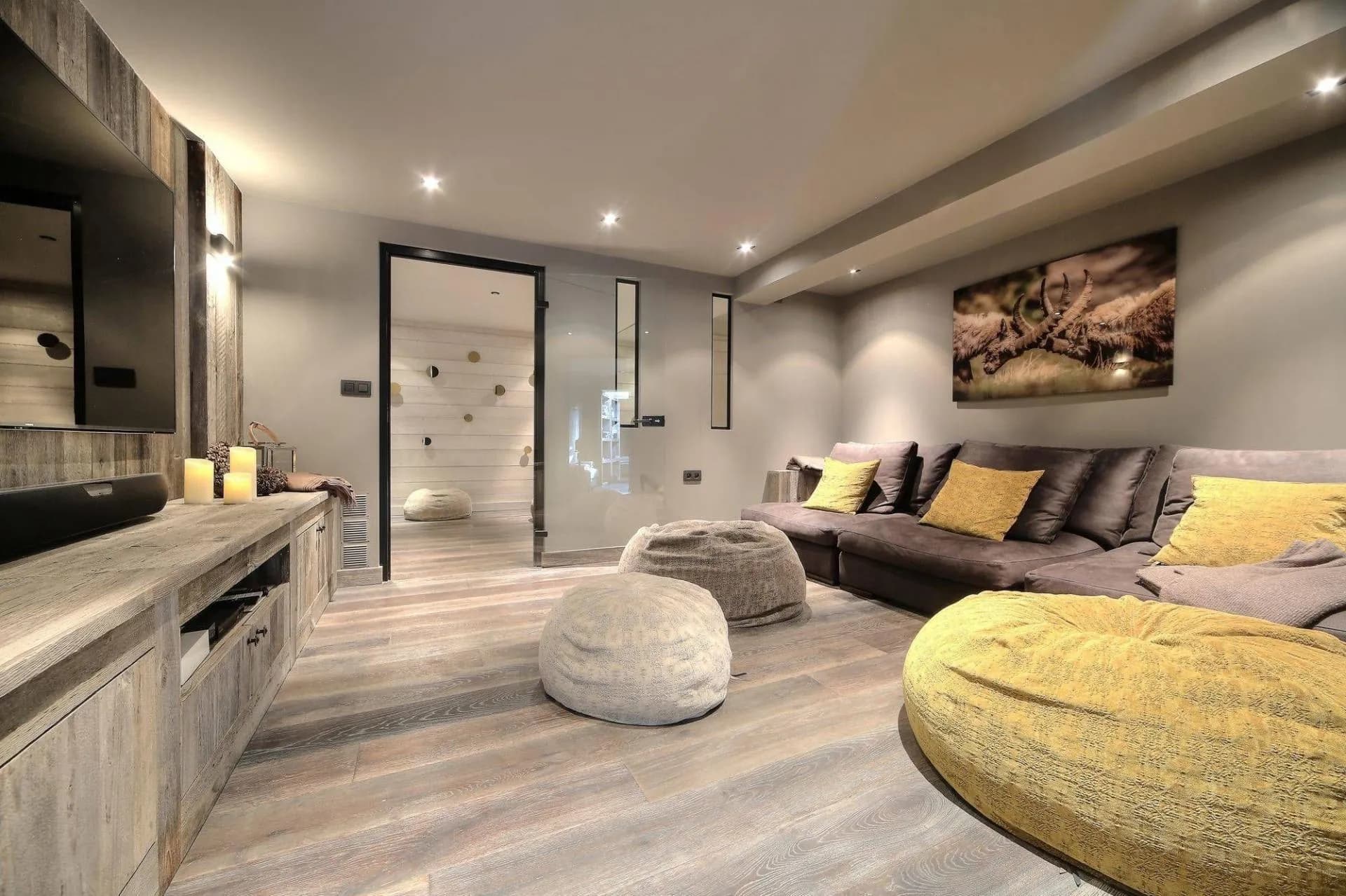 Cinema lounge with sofa and floor cushions
