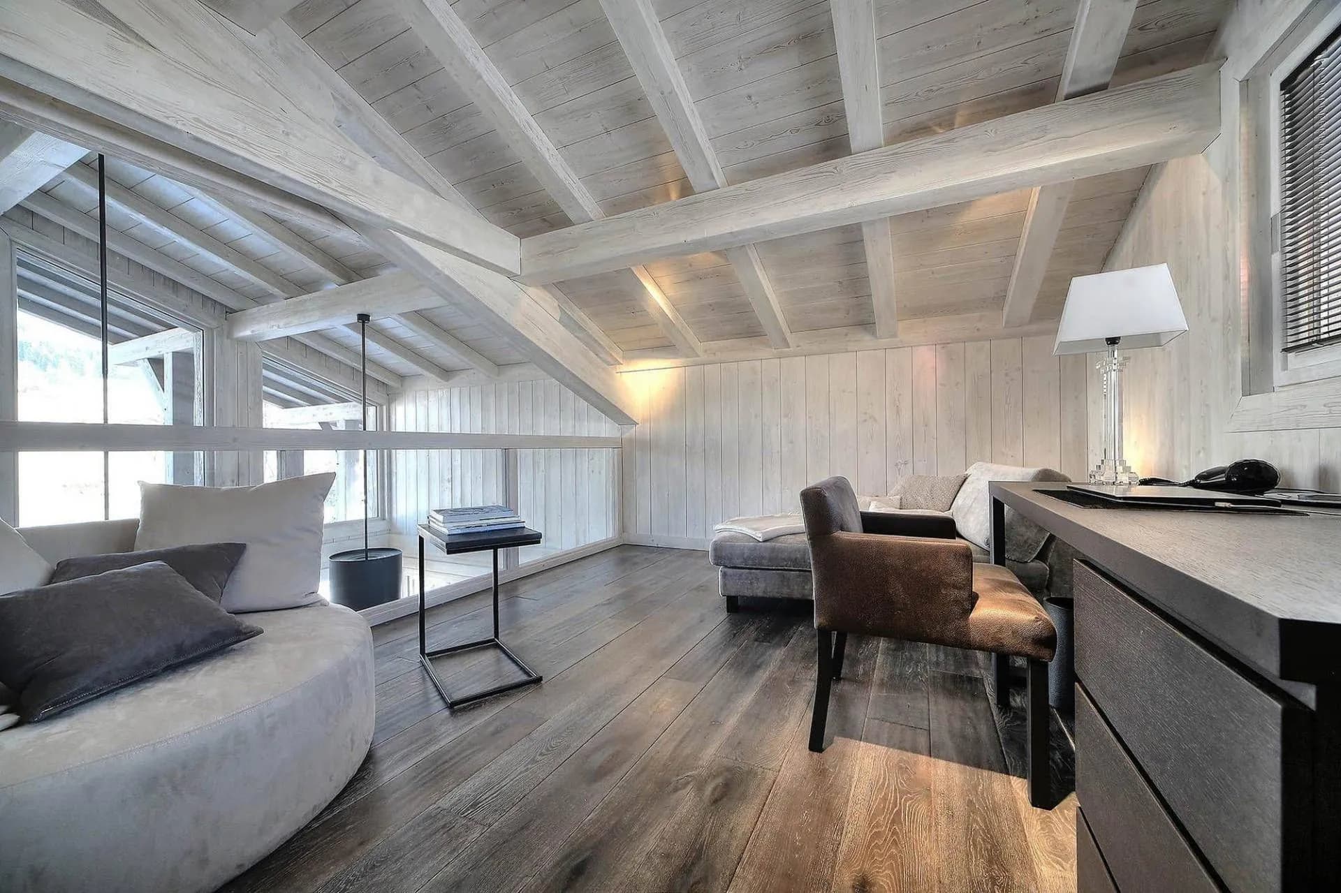 Office and reading area beneath timber beams
