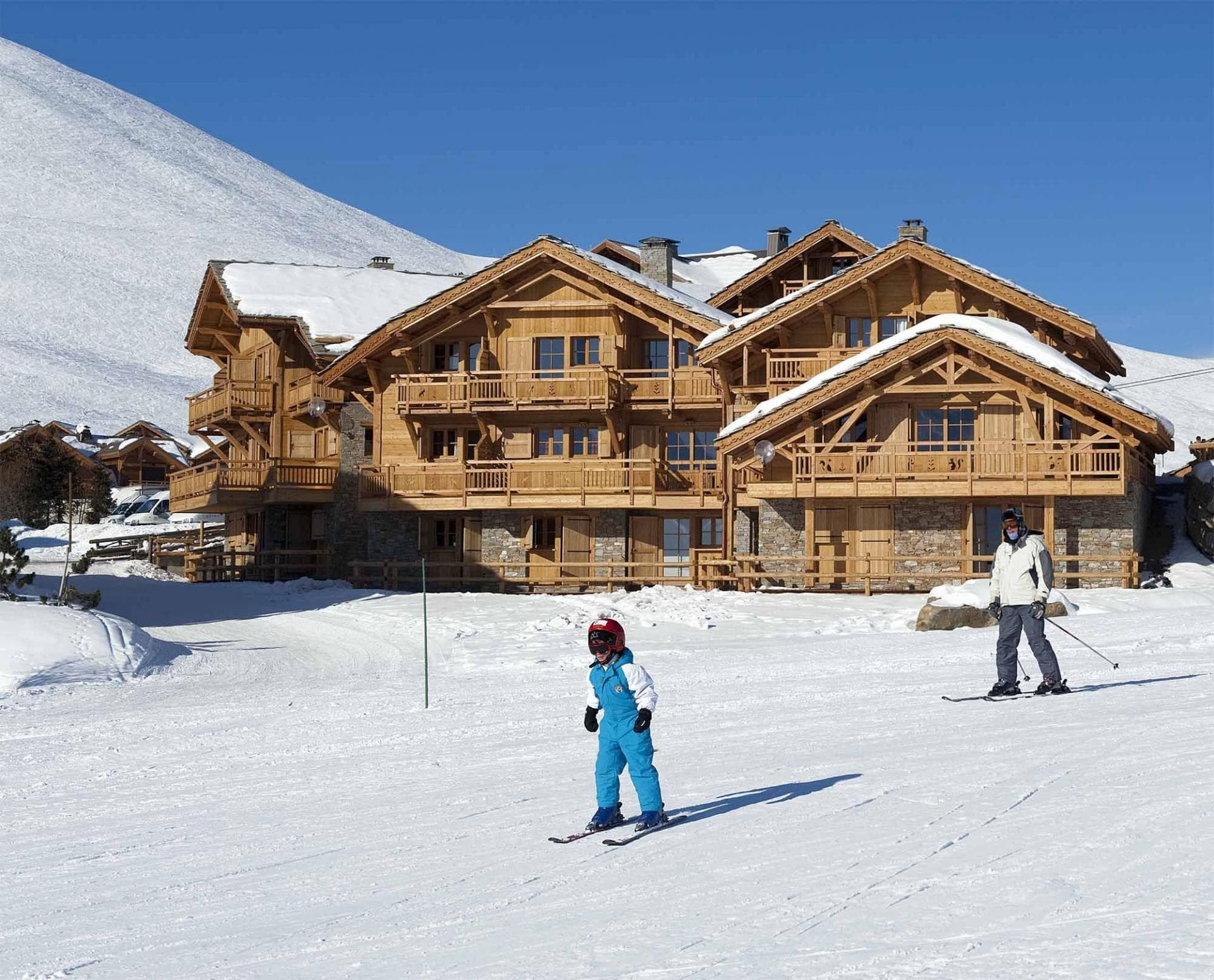 Ski-in, ski-out timber chalet with multiple private balconies