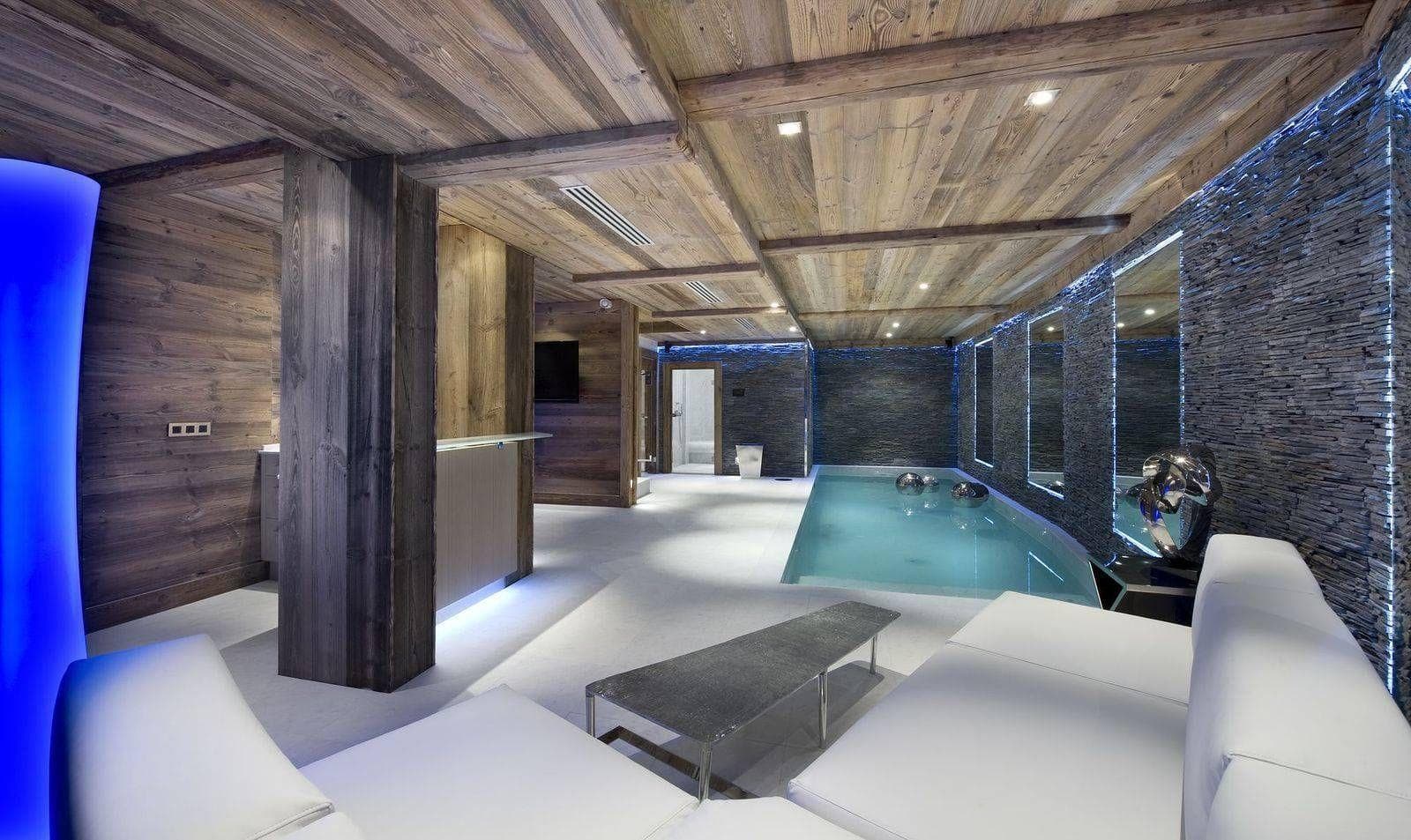 Poolside loungers beside the indoor swimming pool
