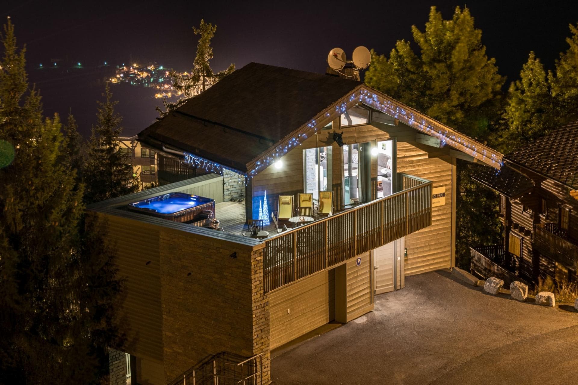 Chalet exterior with private hot tub and valley views