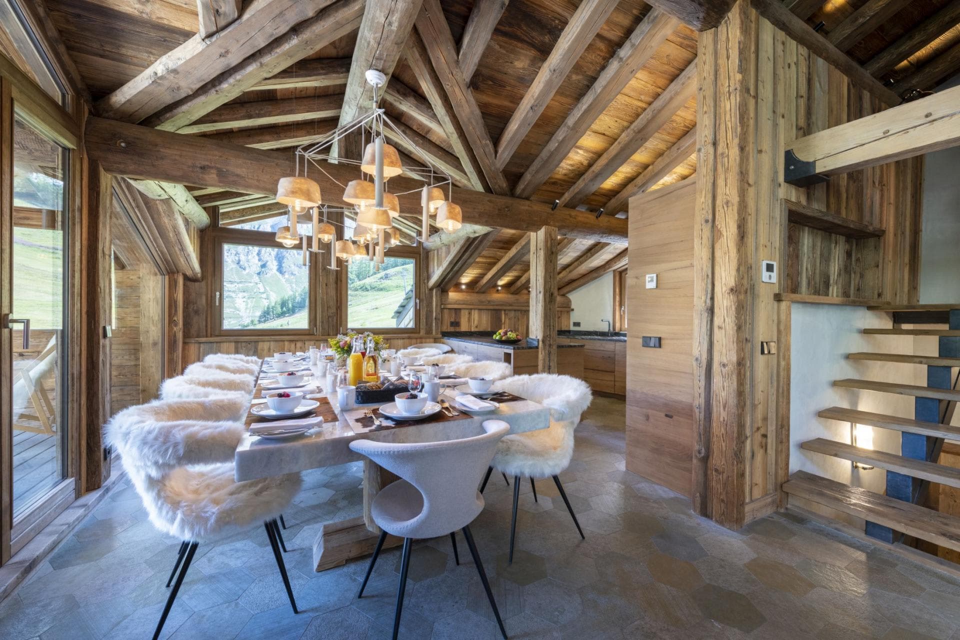 Dining area seats 10; mountain views and vaulted timber ceiling