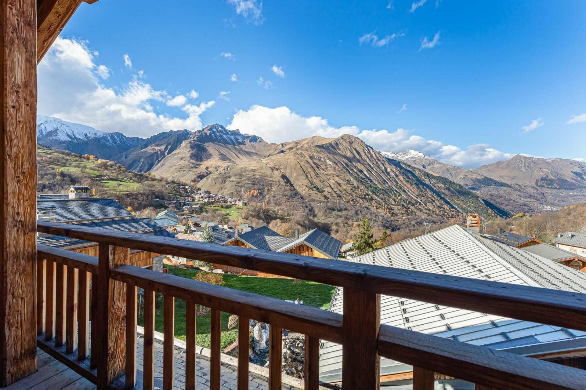 Private balcony with panoramic Alpine valley and mountain peak views