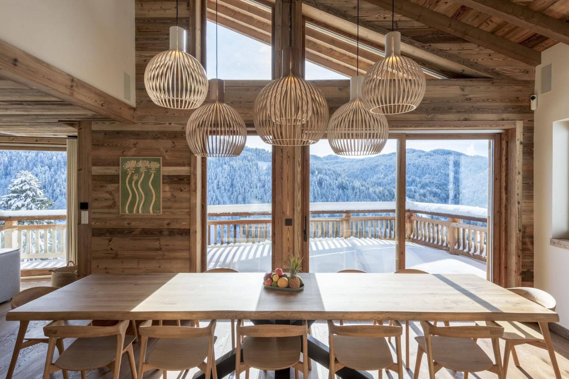 Dining area seating 10 with mountain views and terrace access