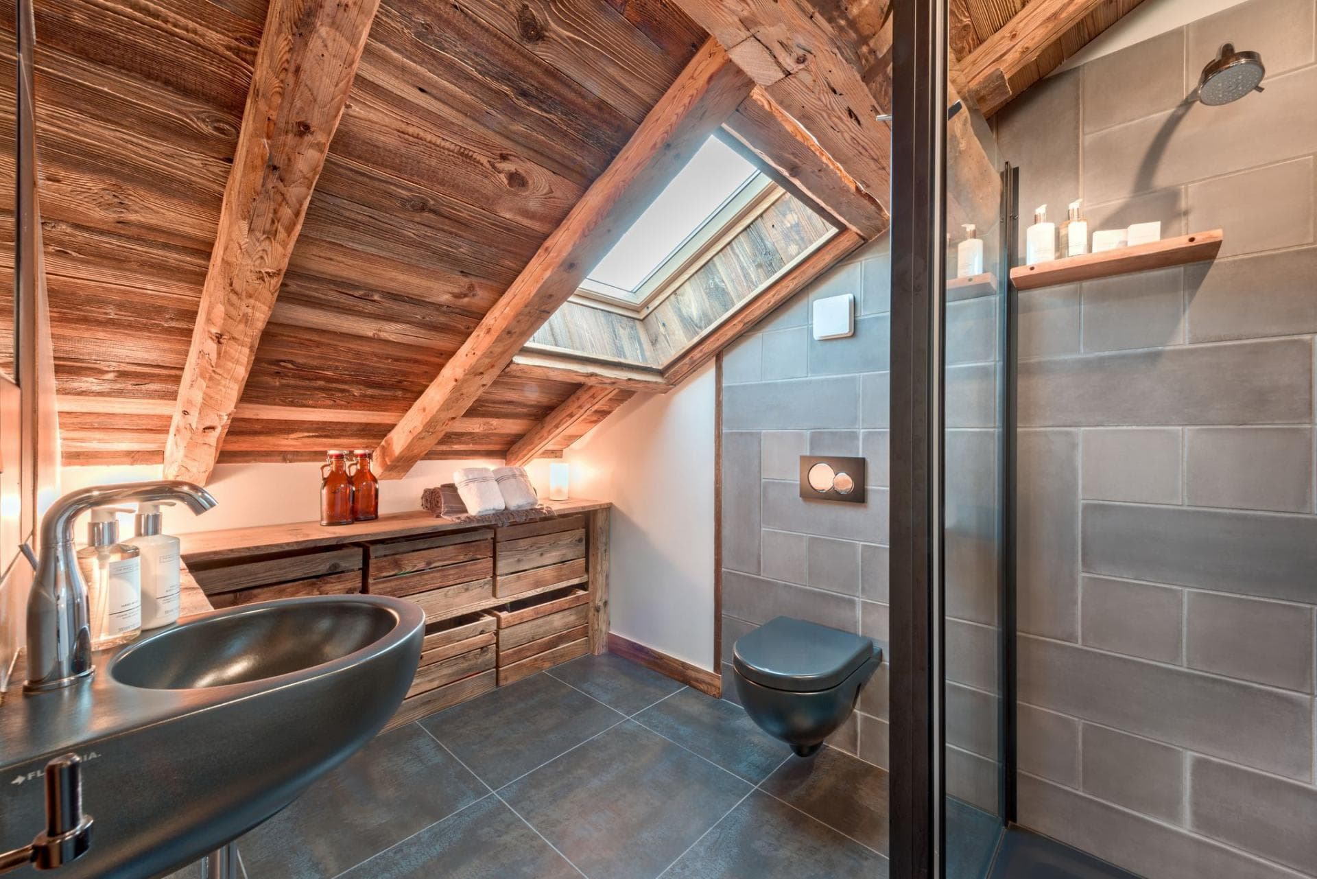 Bathroom with walk-in shower and vaulted timber ceiling with skylight