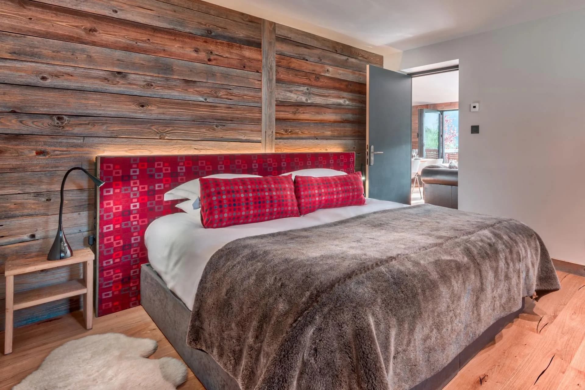 Ground-floor double or twin bedroom with a reclaimed timber wall
