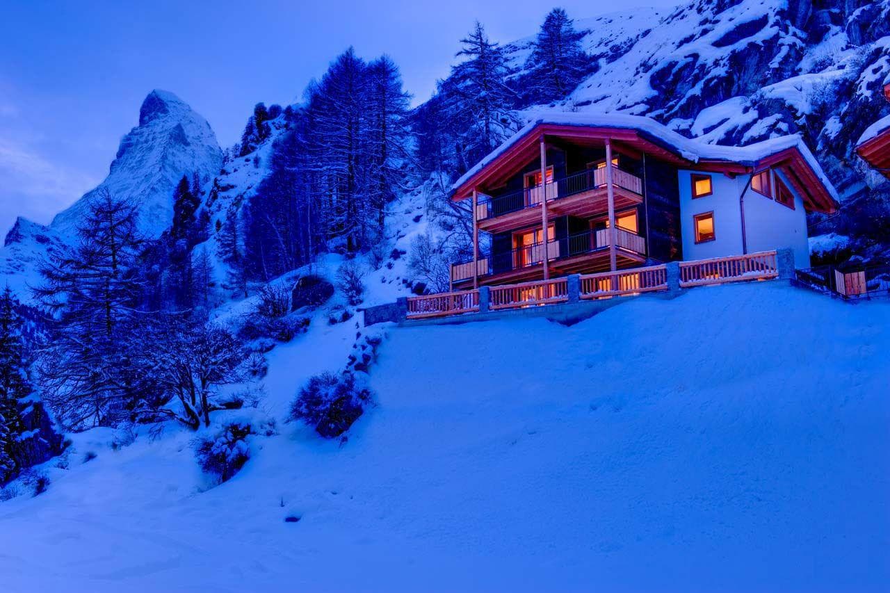 Ski-in chalet exterior with direct Matterhorn views and tiered balconies