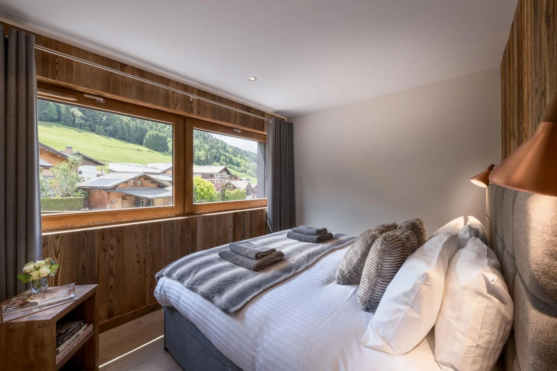 Double bedroom with mountain and chalet views