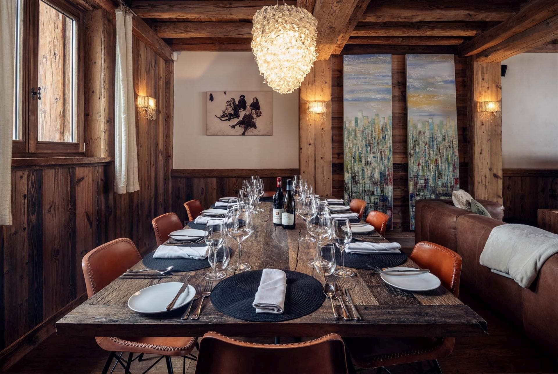Dining area with reclaimed wood table; seating for 10