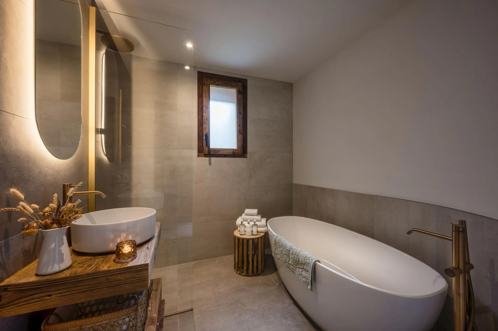 Bathroom with a glass shower enclosure and basin