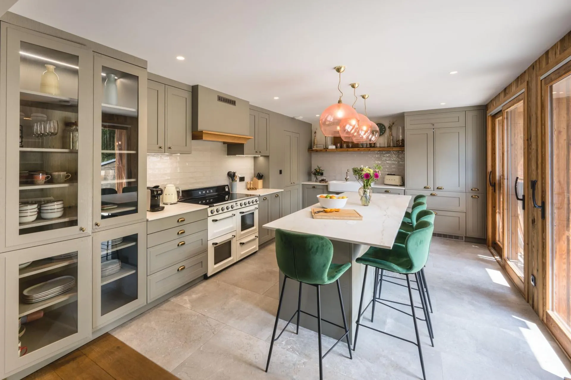Kitchen island with bar seating and a double oven