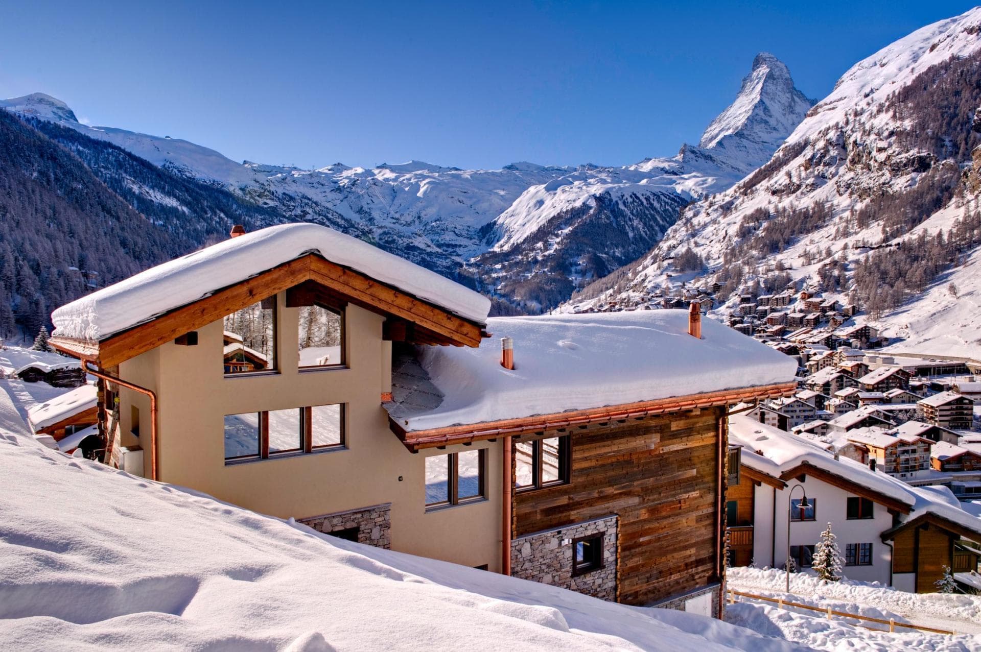 Chalet exterior with timber facade and direct Matterhorn views