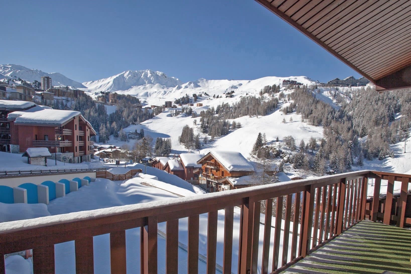 Private balcony with mountain views and direct ski slope access