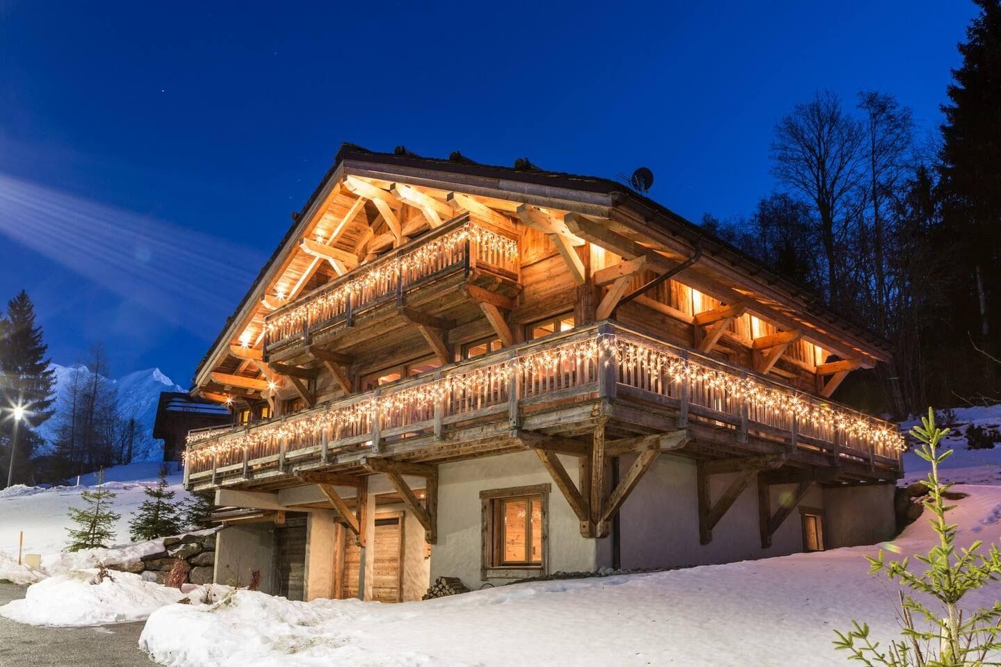 Ski-in chalet with wrap-around balcony and mountain views