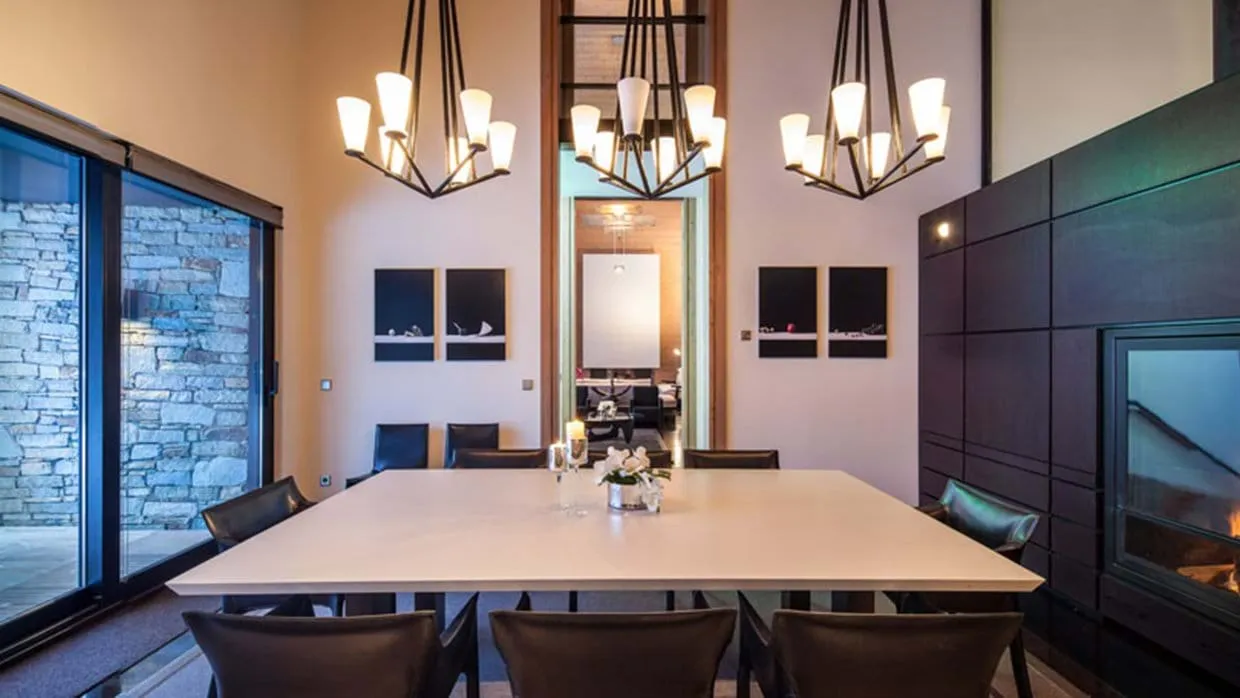 Dining area with seating for 8; includes gas fireplace and patio access