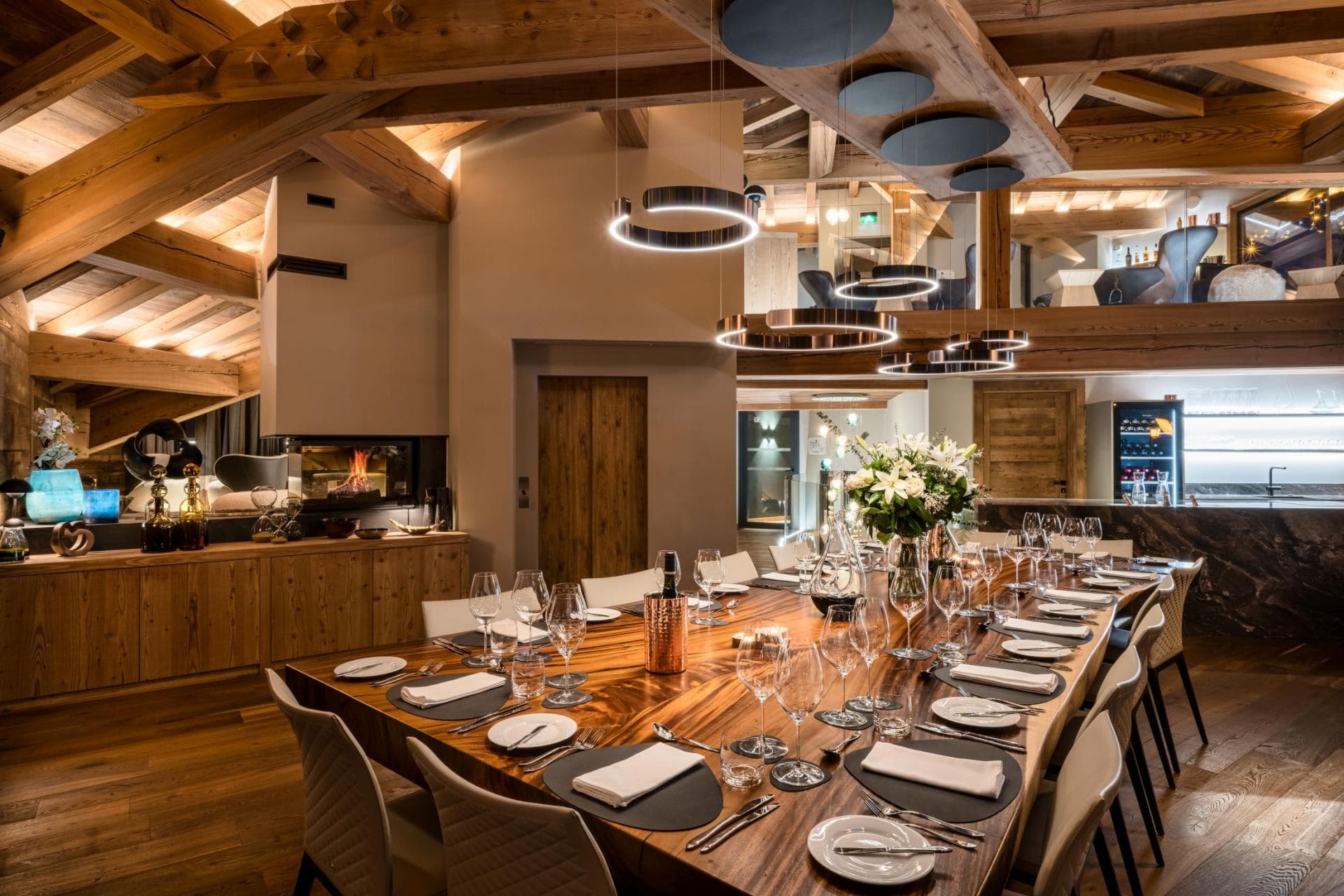 Dining area with seating for 12; wood-burning fireplace and wine fridge