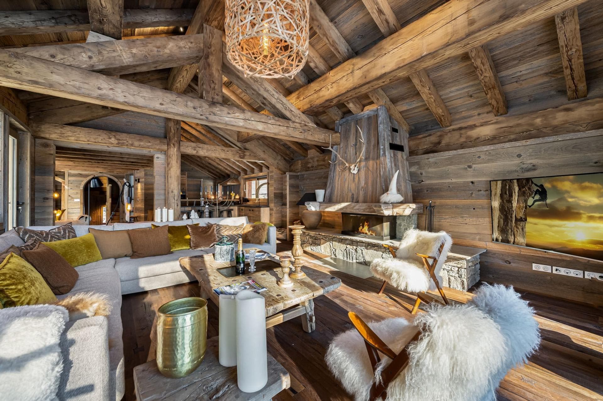 Living area with wood-burning fireplace and sectional seating for 8