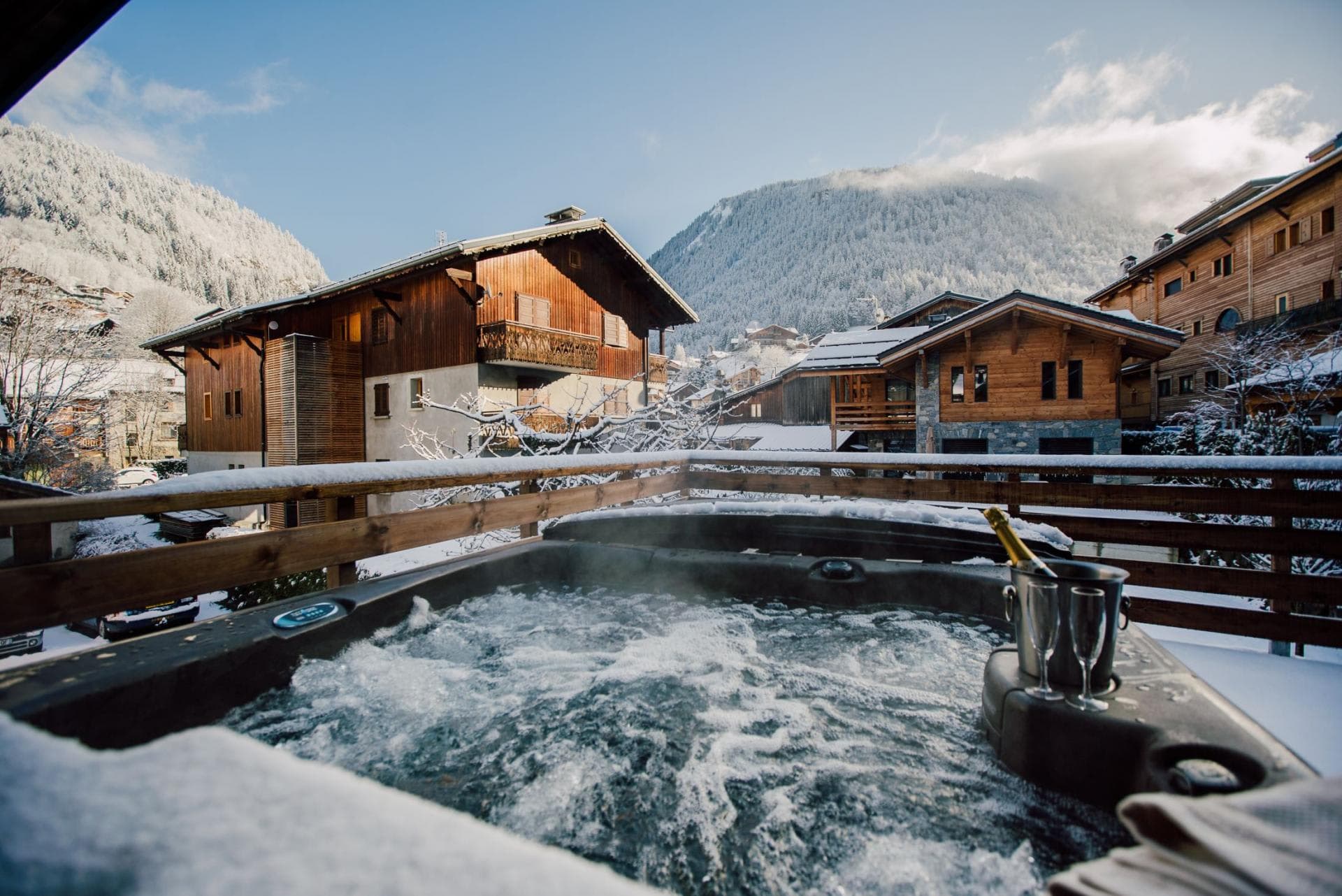 Private balcony hot tub with views of Morzine and surrounding mountains