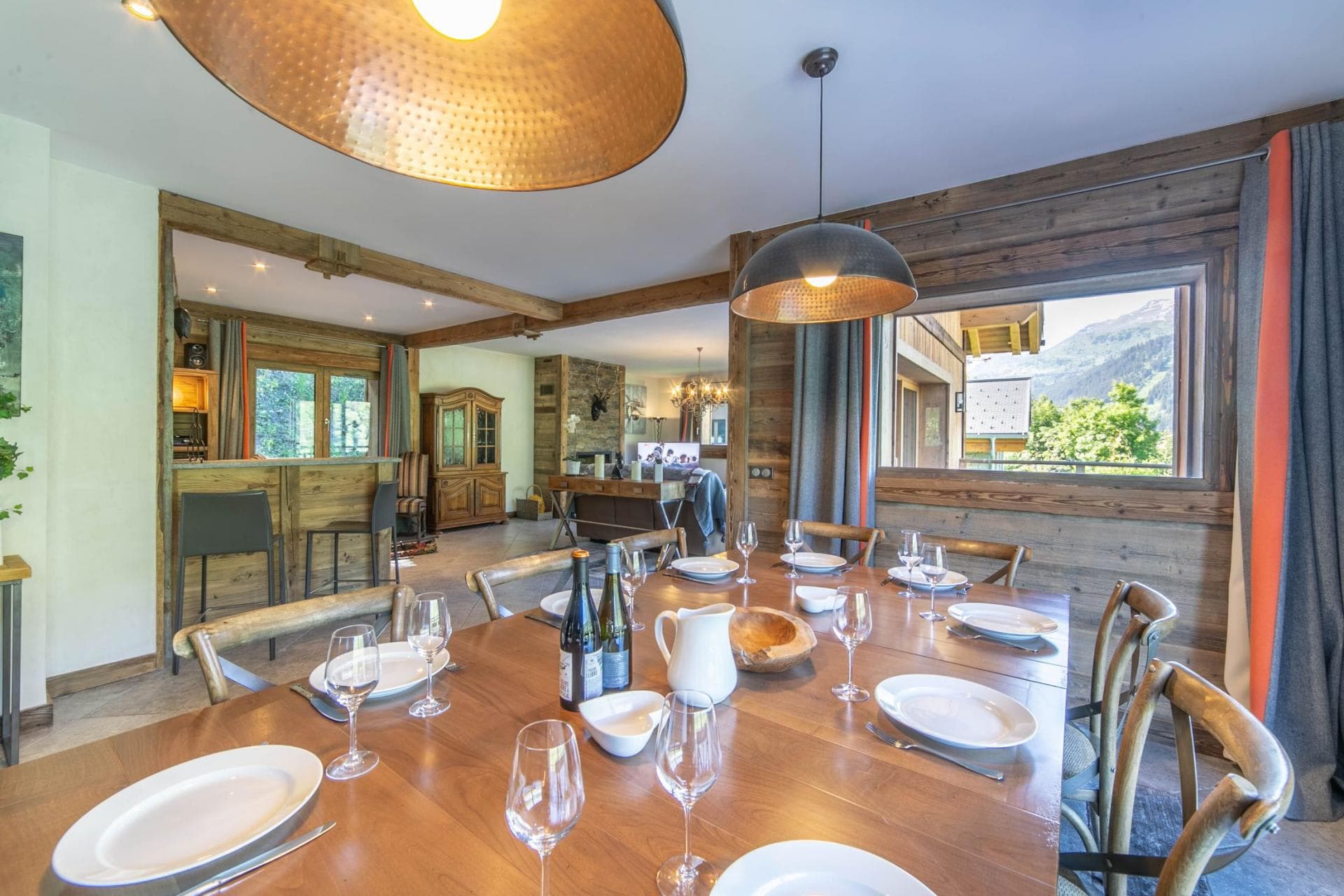 Dining area with seating for 8 and mountain views