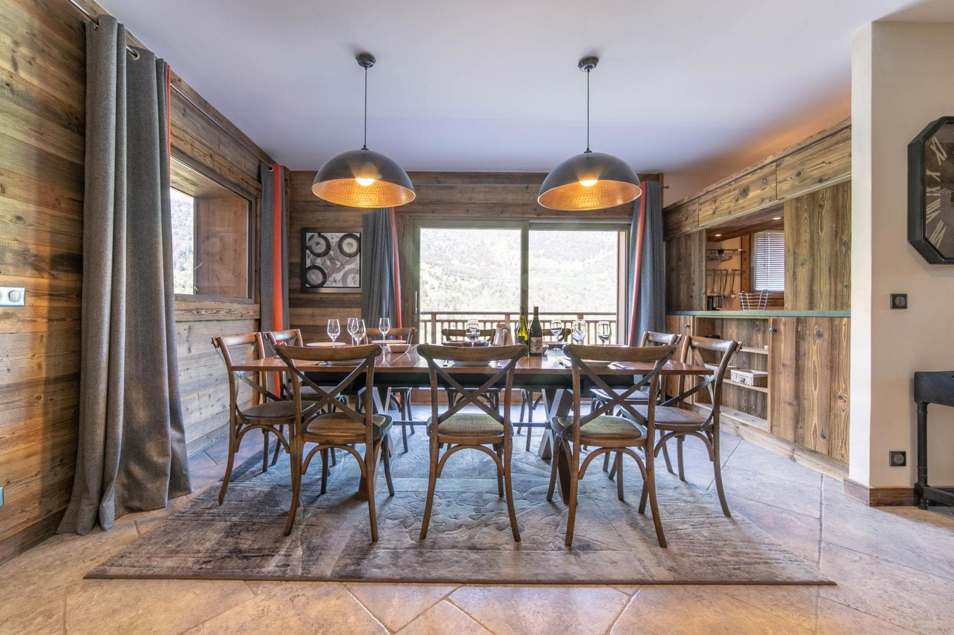 Dining area with seating for 10 and adjacent wet bar
