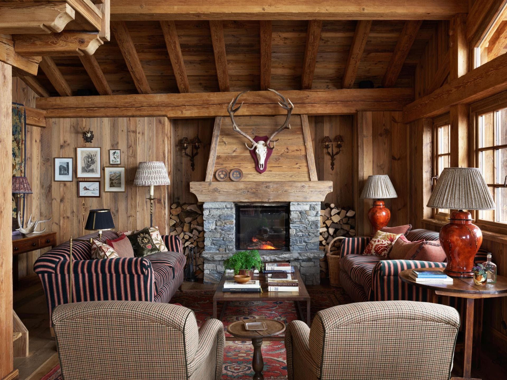 Living room with wood-burning stone fireplace and seating for 6