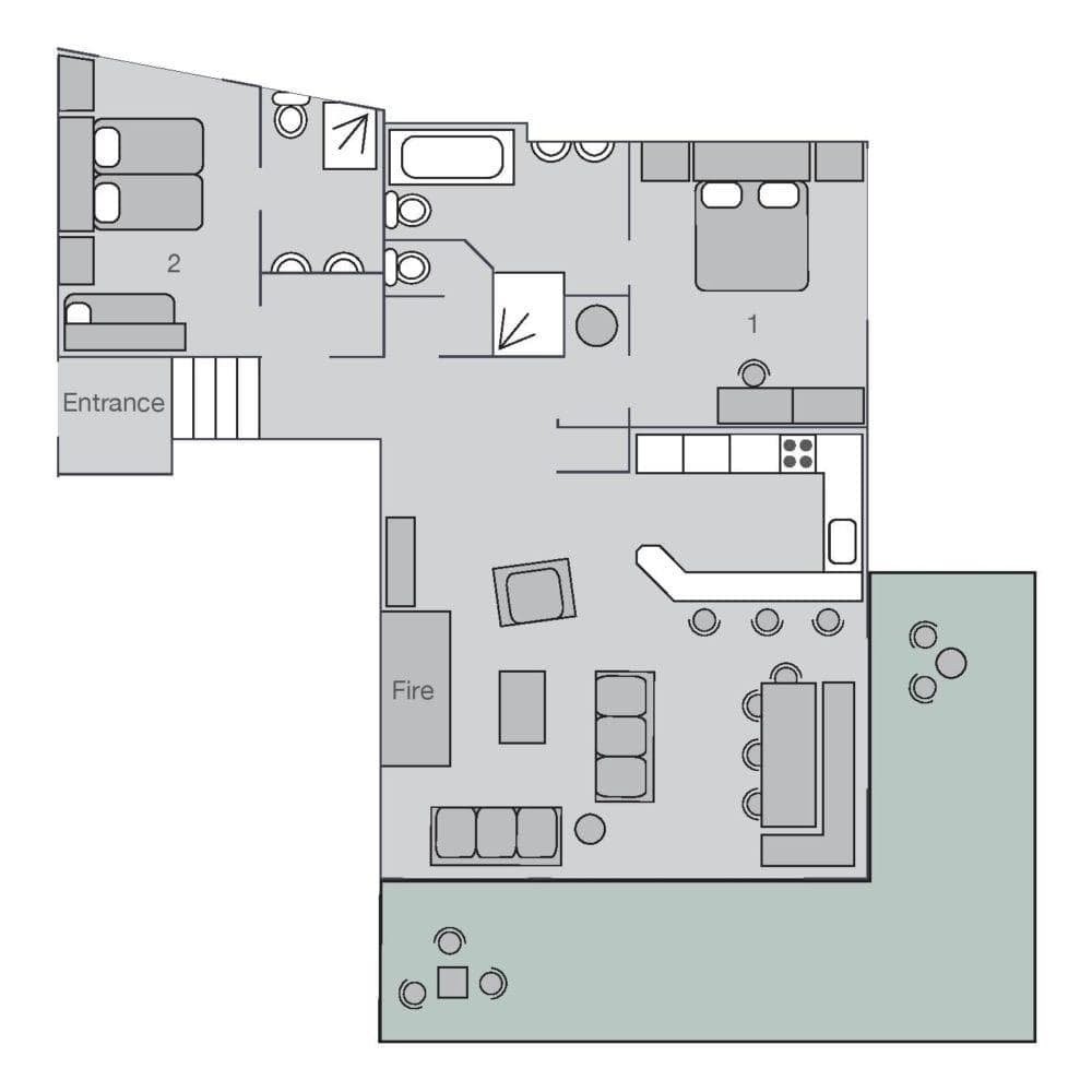 Floor plan: two bedrooms, open living area with fireplace, and wraparound terrace